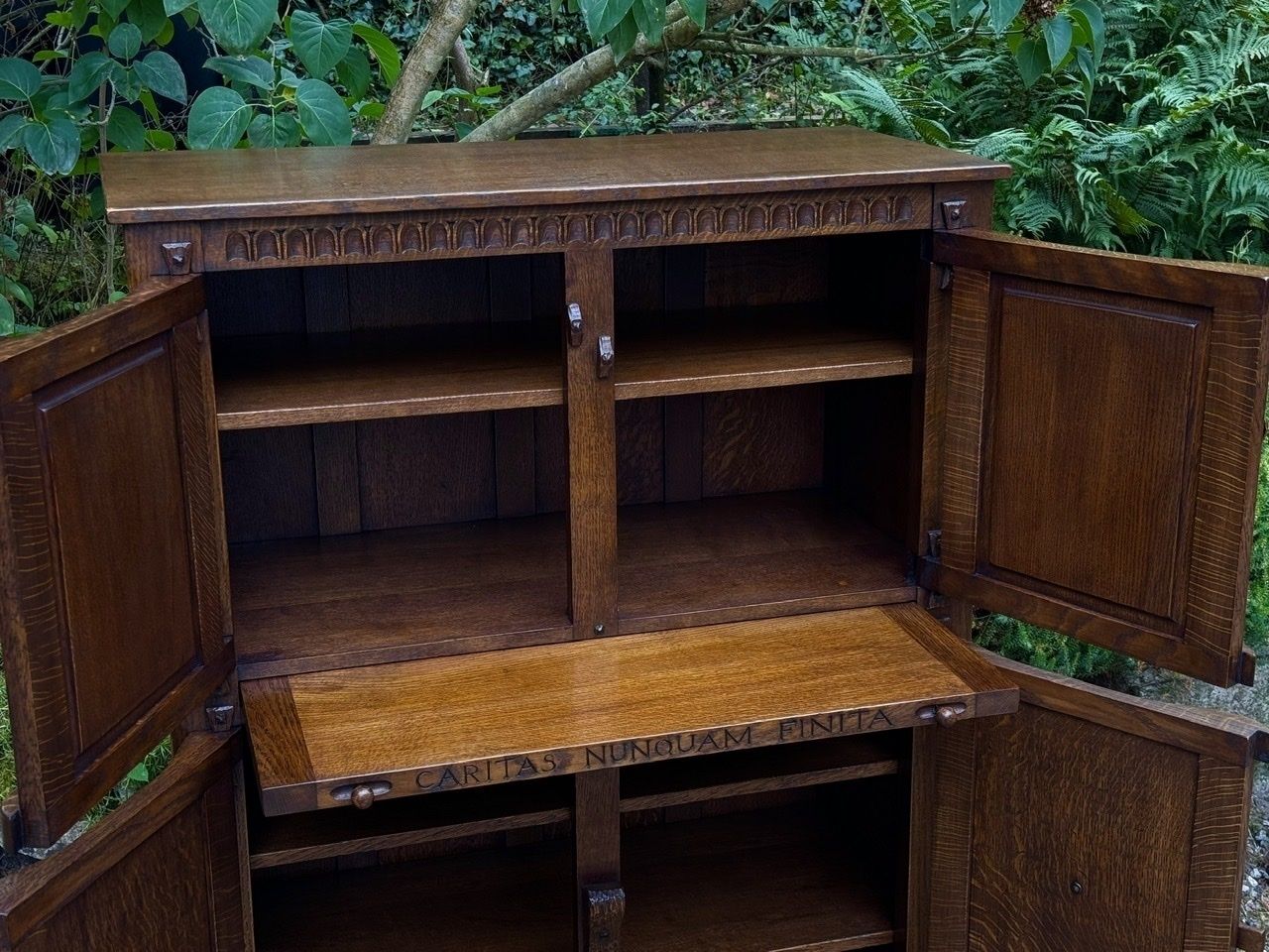 photo furniture A Nigel Griffiths Monastic Carved Oak Flemish Drinks Cabinet / Wine Cupboard