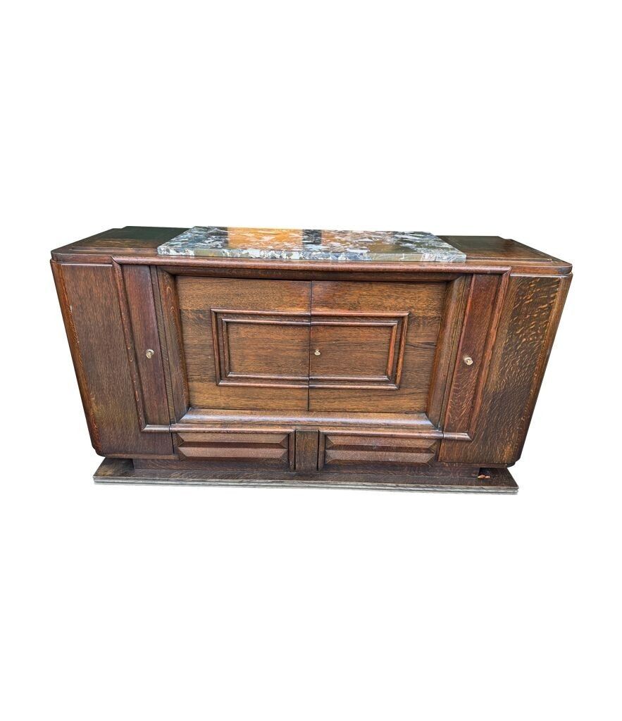 photo for sale An Art Deco 1940s Oak Sideboard By Gaston Poisson With Original Marble Top.