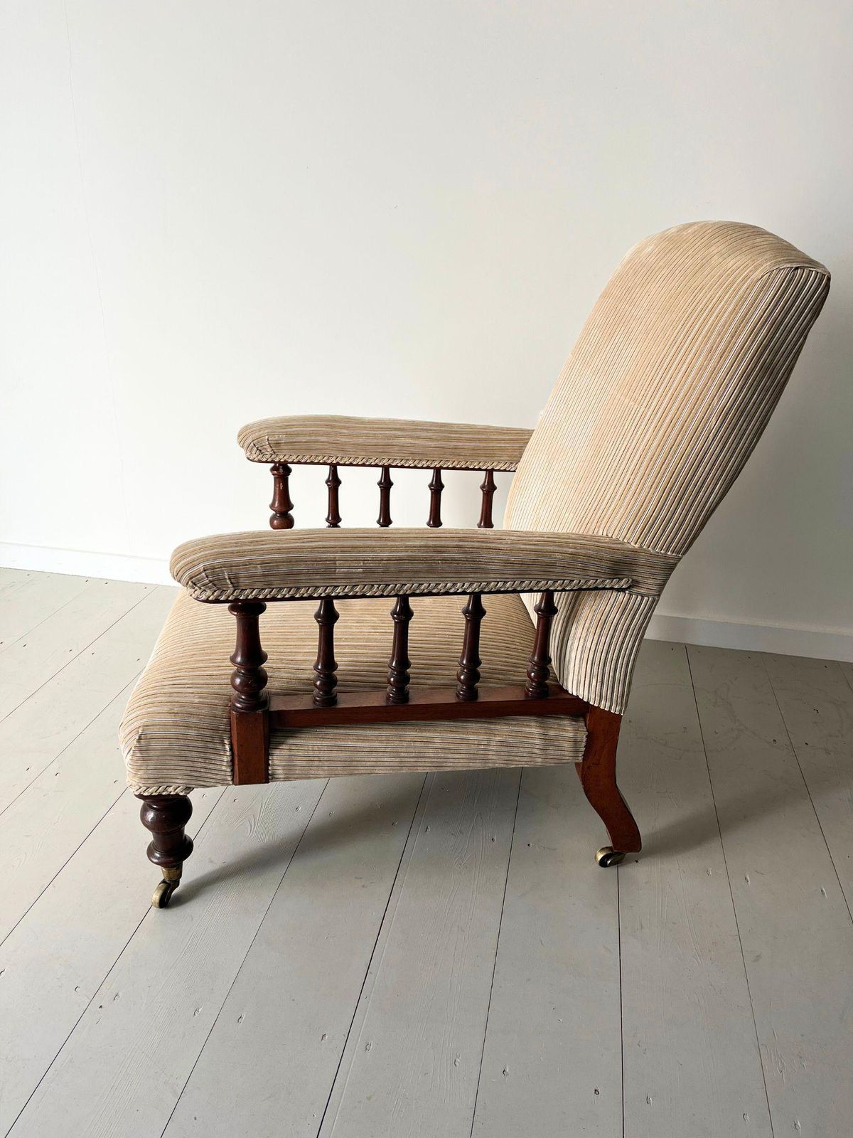 Antique Armchair Howard Style Open Arm Upholstered Gentleman's Chair 19th Century Neutral Beige Cord Fabric And Turned Legs & Brass Castors photo vintage