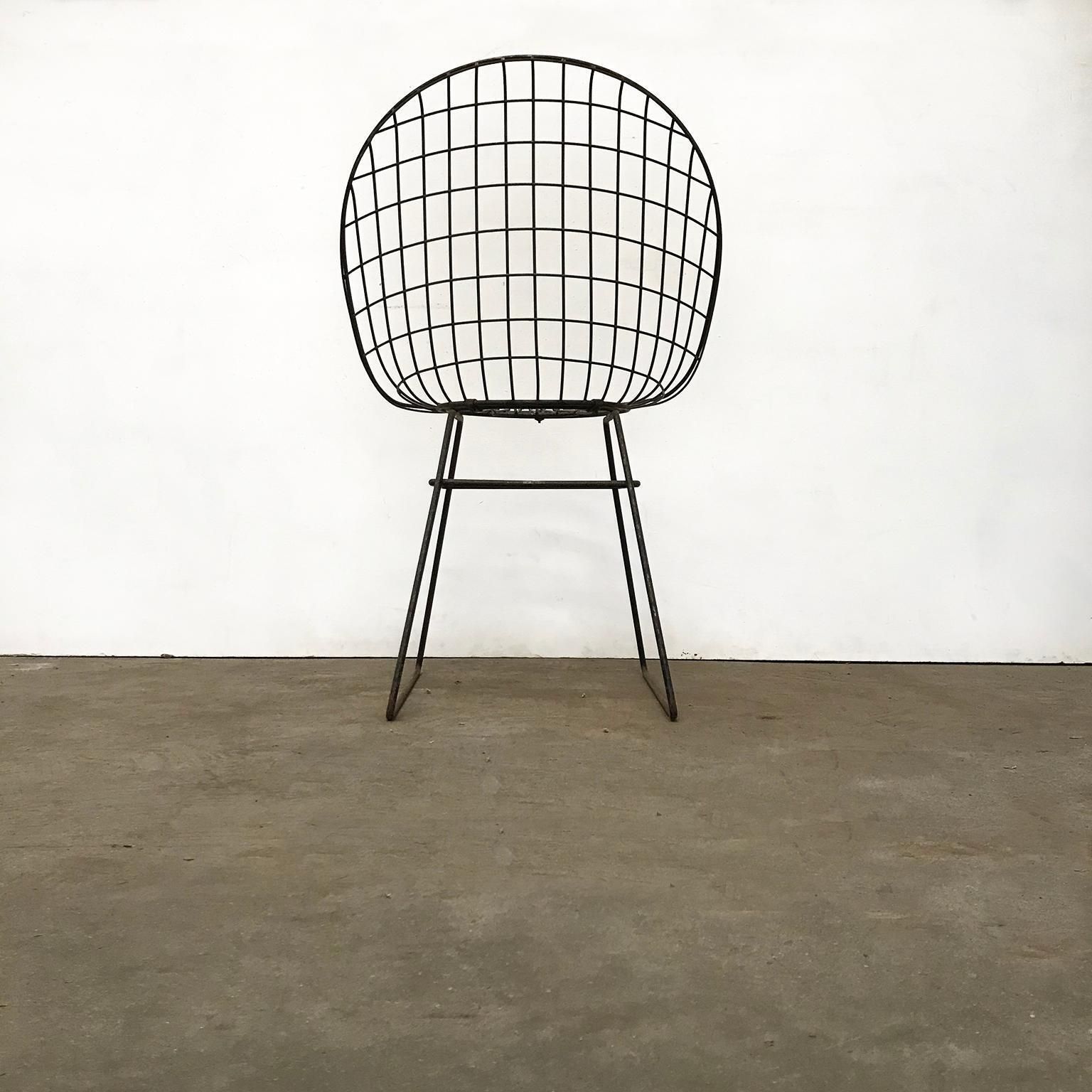 photo for sale Black Wire Dining Chair With Beautiful Curves And Elegant Silhouet, Circa 1960