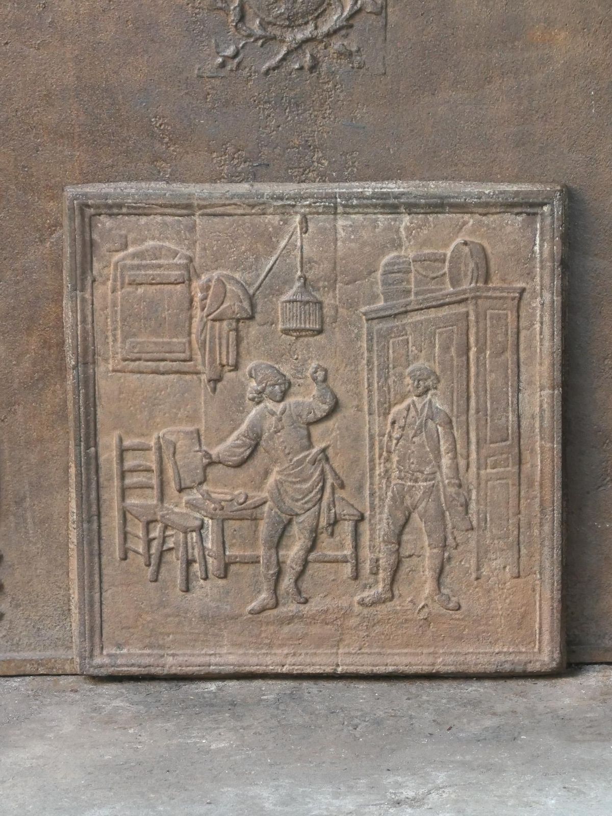 19th   20th Century French 'The Cobbler And The Financier' Fireback / Backsplash photo for sale