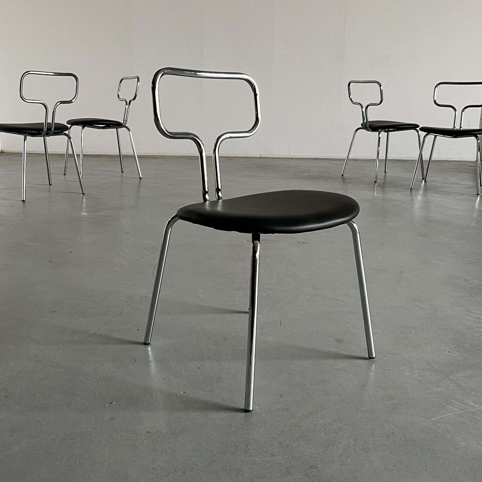 Bauhaus Design Curved Chrome Tubular Steel And Faux Leather Dining Chairs photo furniture
