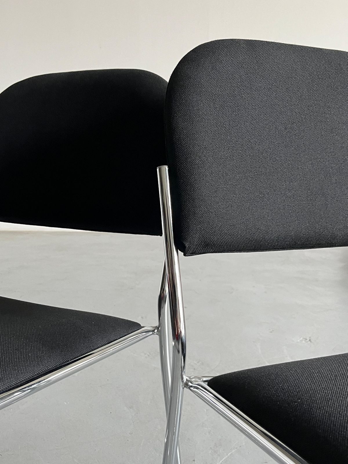 photo for sale Set Of 4 Minimalist Dining Chairs In Black Fabric And Chromed Steel, Stackable