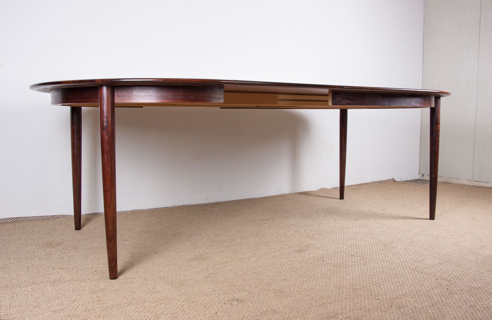 Danish Extendable Dining Table In Rosewood Model 55 By Arne Vodder For Sibast 1958. photo vinterior