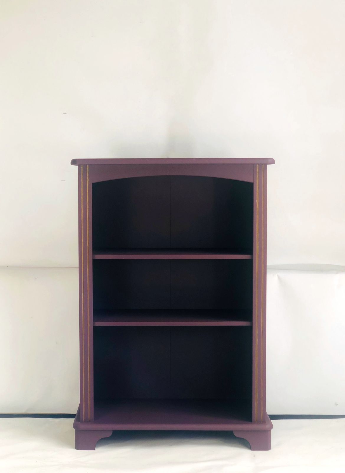 Painted Purple Bookshelf With Gold Trim Detail photo 95.0