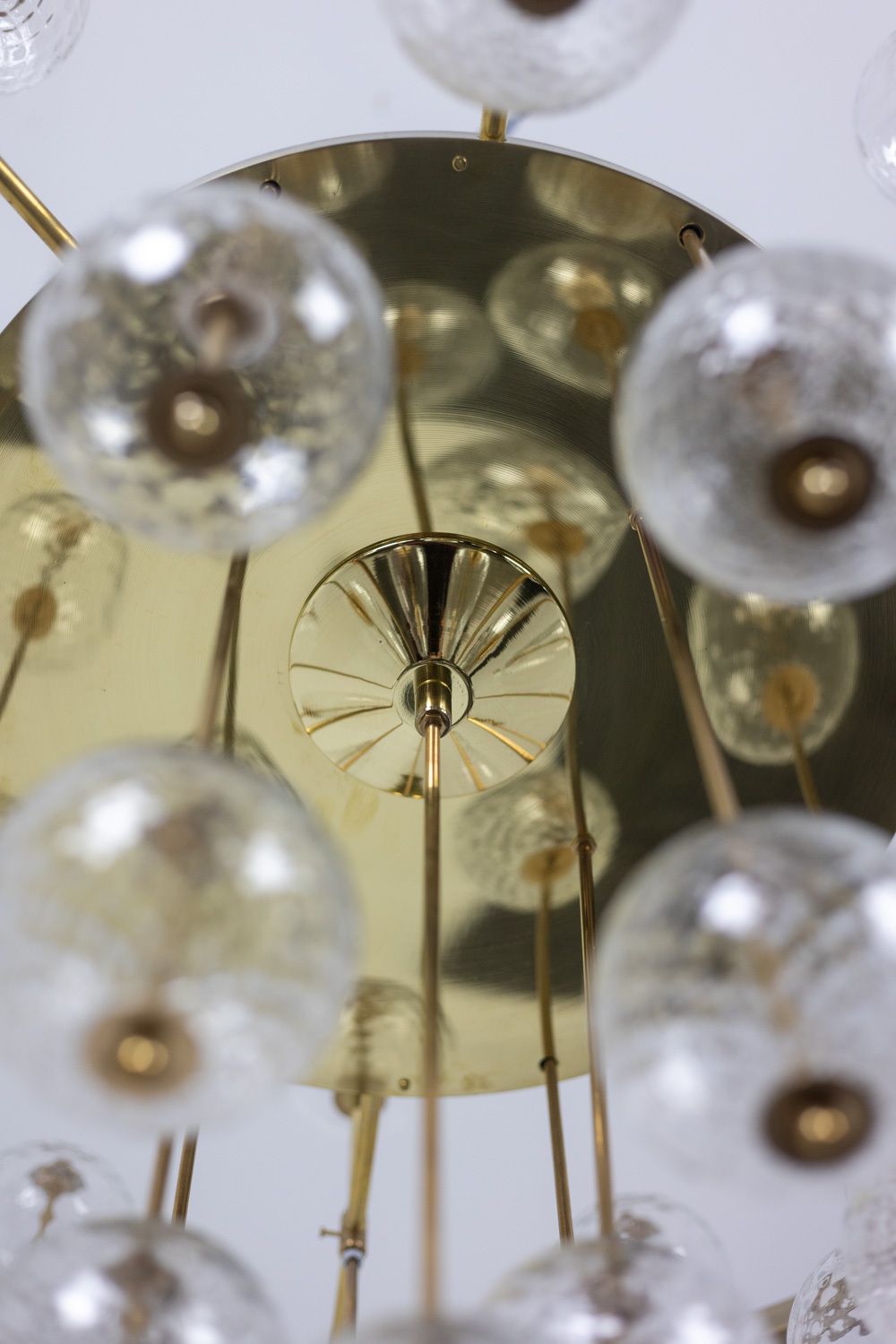 photo for sale Large Chandelier In Gilded Brass And Decorative Balls. 1970s.