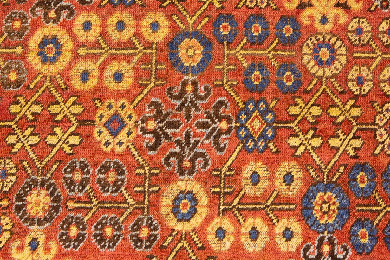 Textiles Antique Khotan Rug, 1800 1820 photo