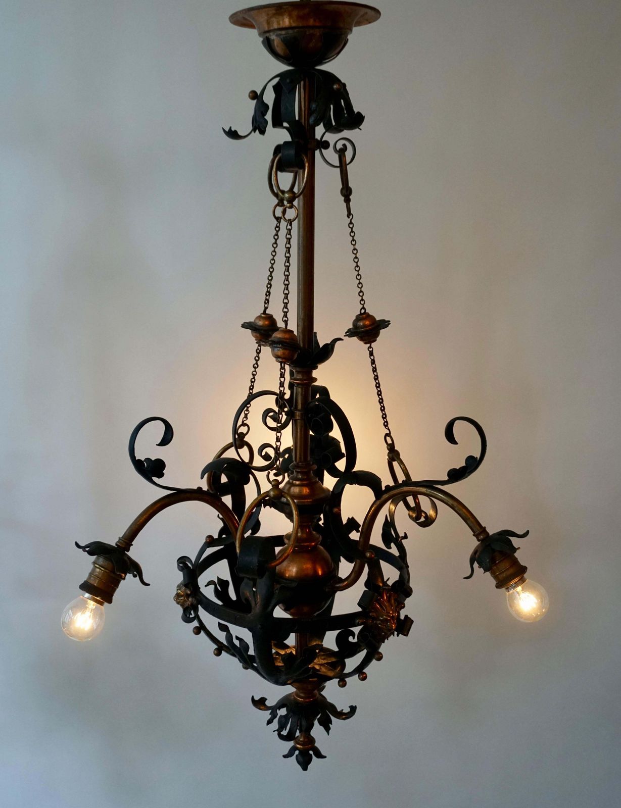 photo for sale Arts & Crafts Wrought Iron And Copper Castle Chandelier With Bronze Lion Heads