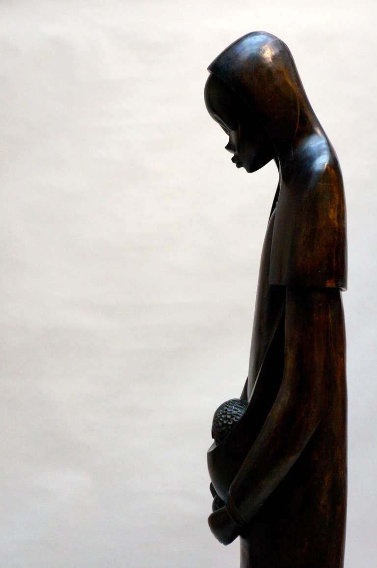 Midcentury African Hand Carved Wood Sculpture Of Maria With Child photo for sale