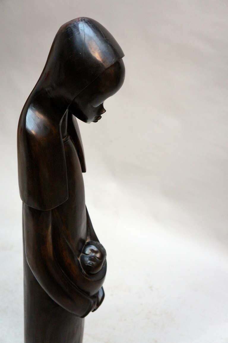 Midcentury African Hand Carved Wood Sculpture Of Maria With Child photo vinterior