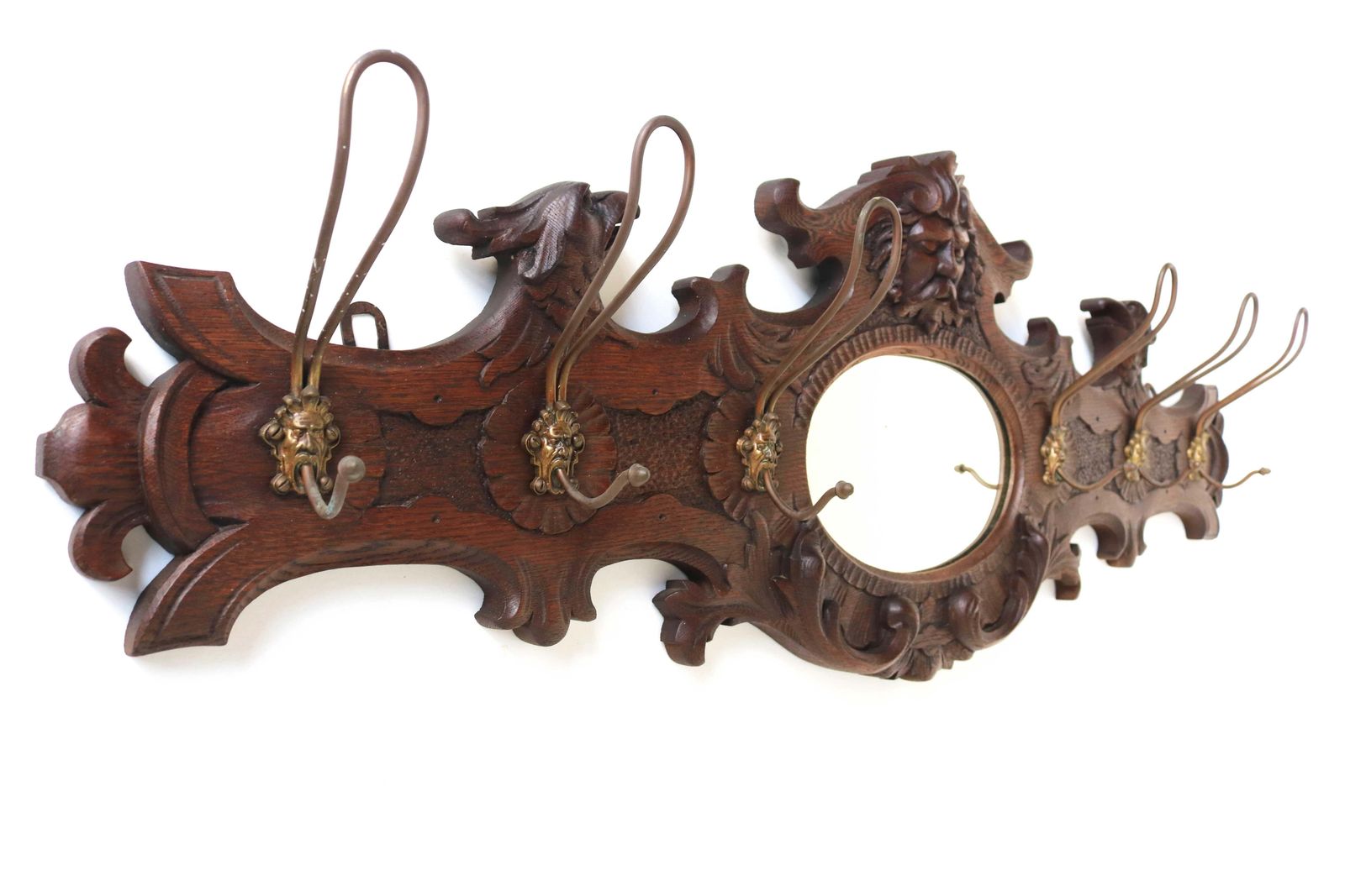 photo for sale Antieke Houten Kapstok Met Gesneden Masker En Adelaar, Spiegel En Messing Haken, 19e Eeuw