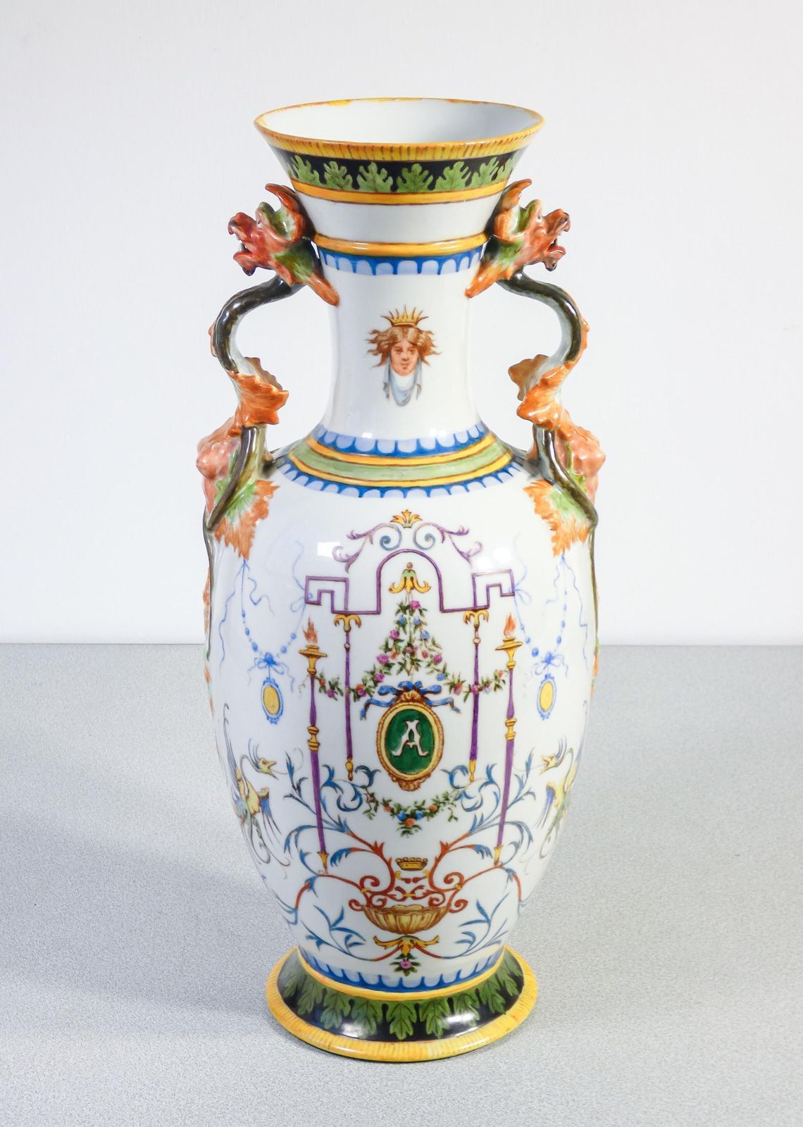 Pair Of Painted Ceramic Vases With Grotesques, Carvings On Handles. 1887 photo for sale