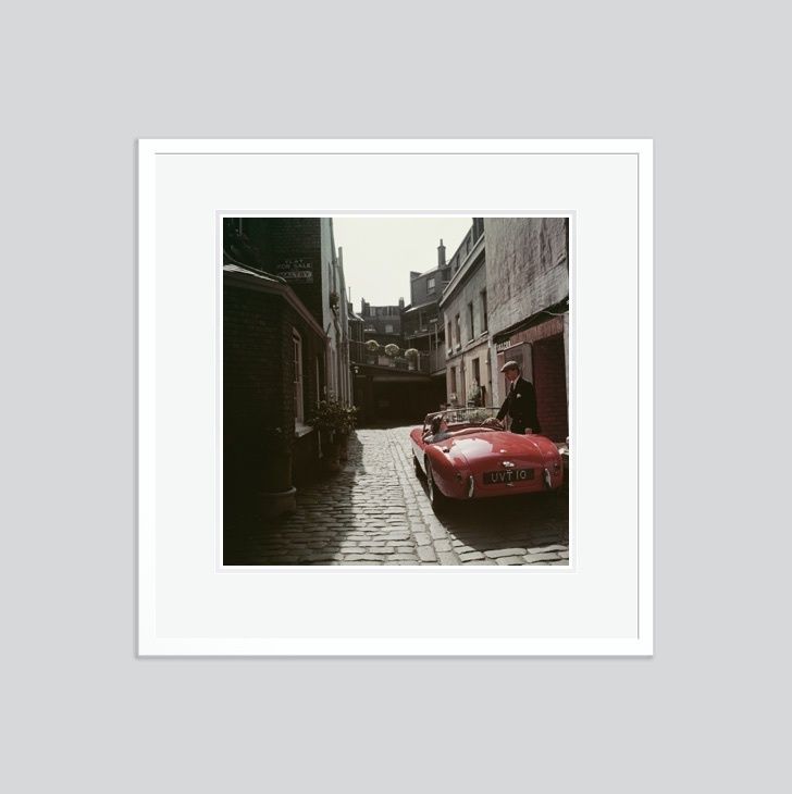 Slim Aarons 'Sports Car Couple' Framed White photo furniture