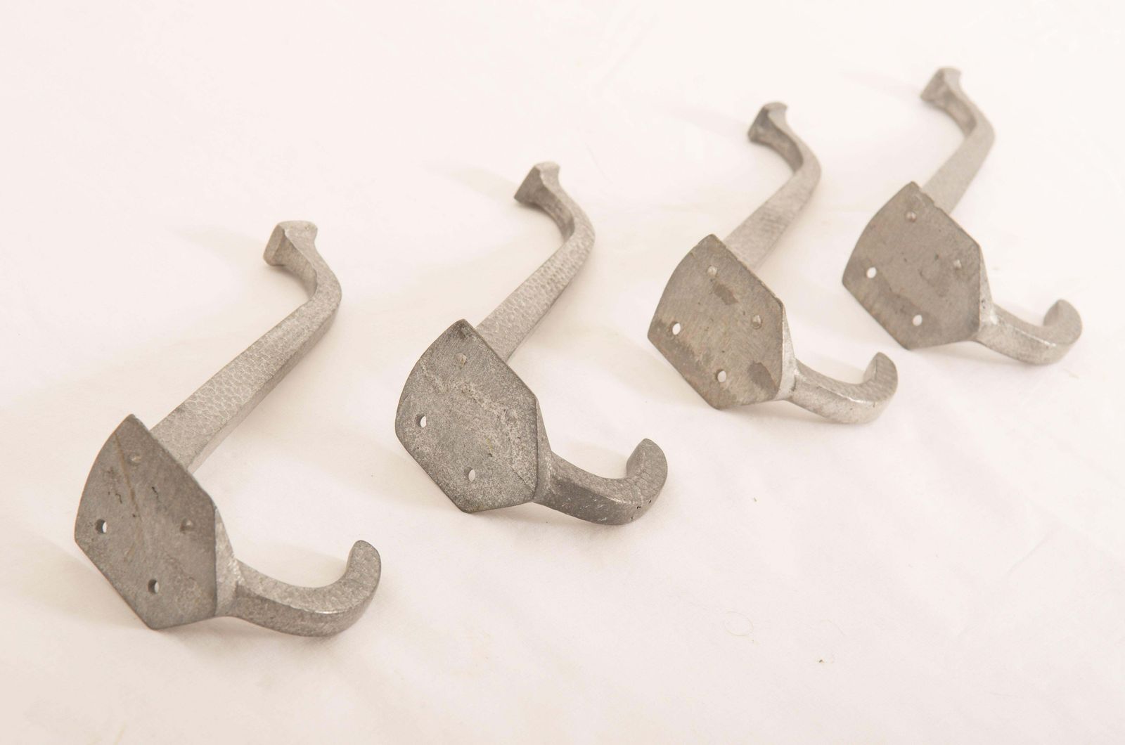 Set Of Four Vienna Secession Aluminum Coat Hooks photo furniture