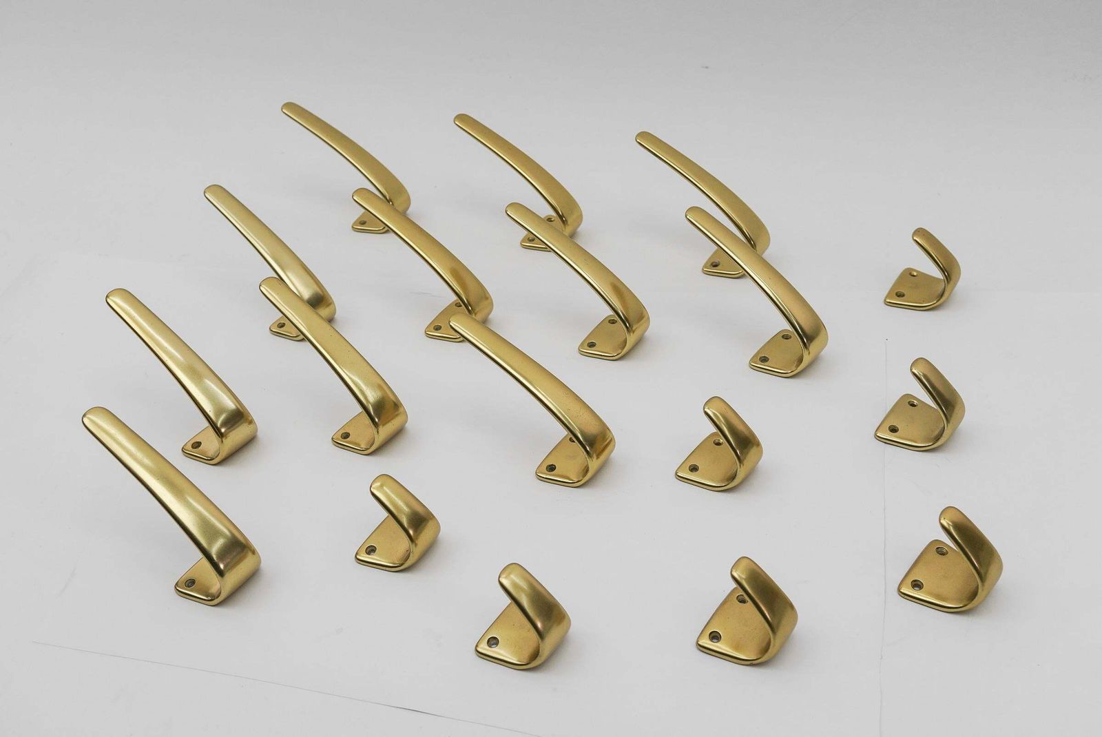 Set Of 18 Midcentury Brass Wall Hooks, Austria, 1950s photo for sale