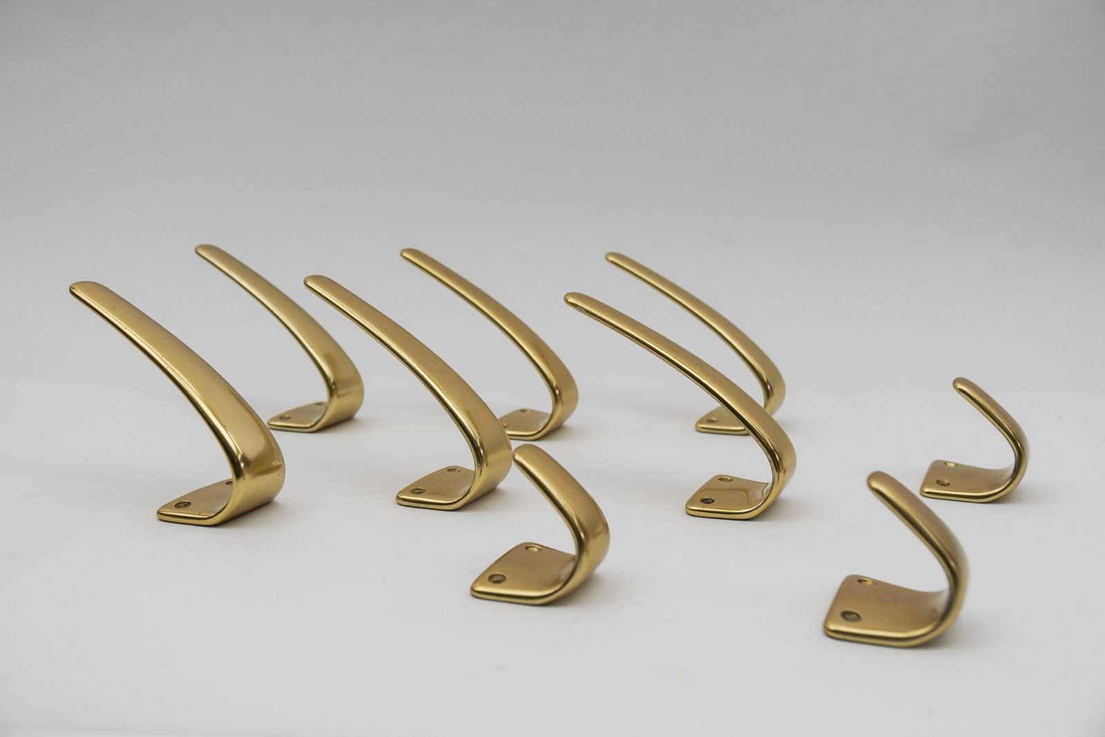 Set Of 18 Midcentury Brass Wall Hooks, Austria, 1950s photo vinterior