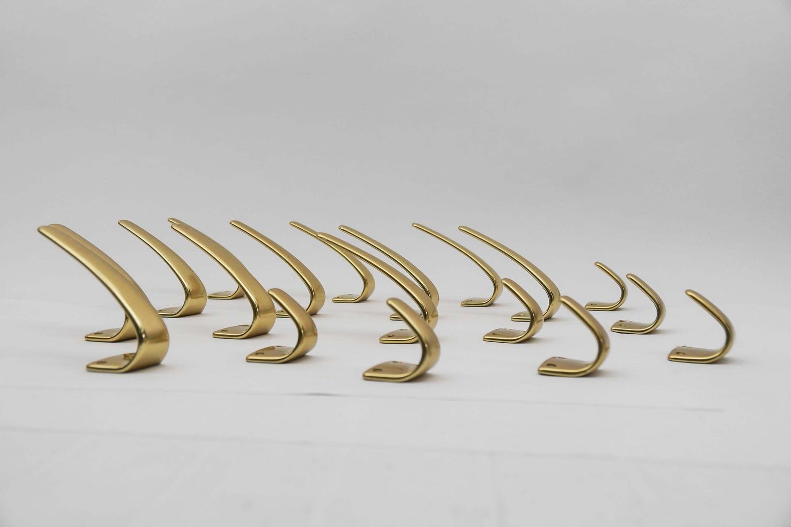 photo buy Set Of 18 Midcentury Brass Wall Hooks, Austria, 1950s