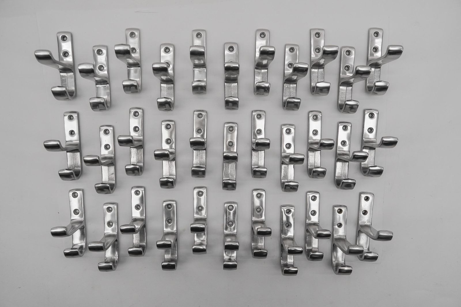 Set Of 35 Midcentury Aluminium Wall Hooks, Austria, 1950s photo furniture