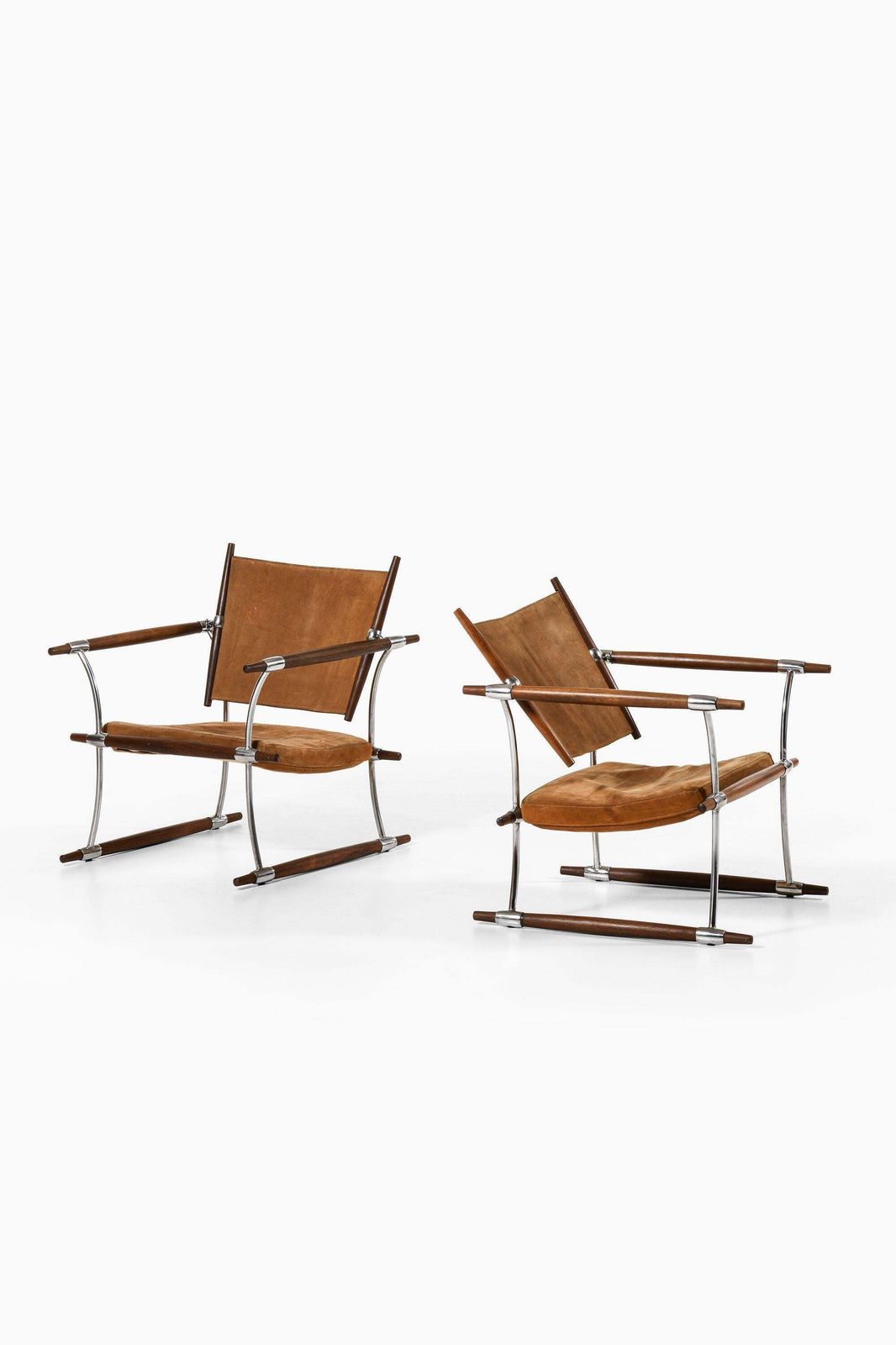 Pair Of Easy Chairs In Rosewood & Steel Frame By Jens Harald Quistgaard, 1960's photo furniture