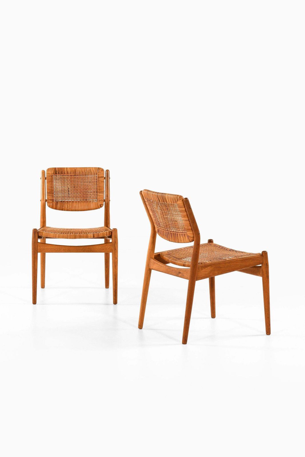Set Of 8 Dining Chairs In Oak And Woven Cane By Arne Vodder, 1951 photo furniture
