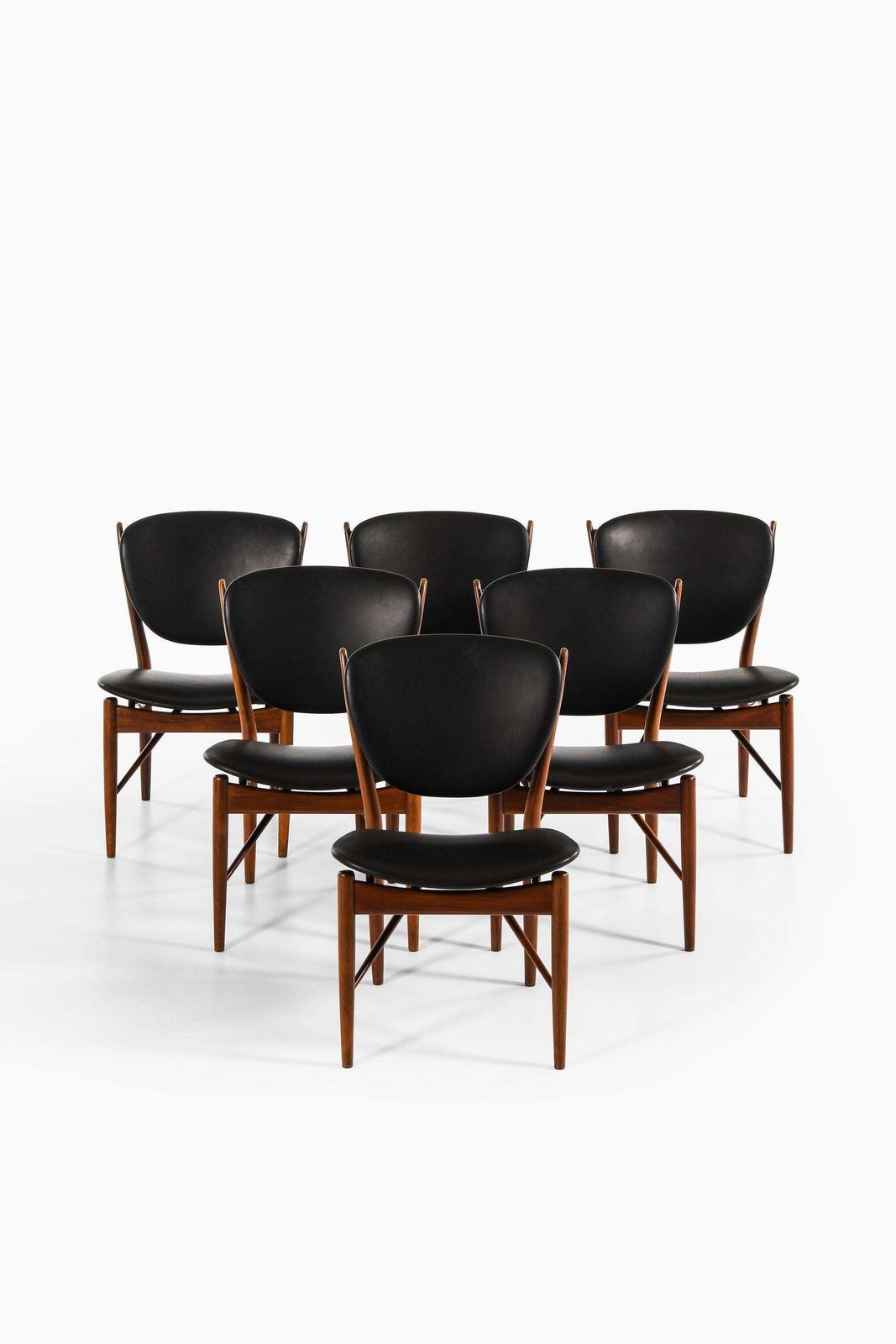 Dining Chairs In Rosewood And Black Leather By Finn Juhl, 1951 photo furniture