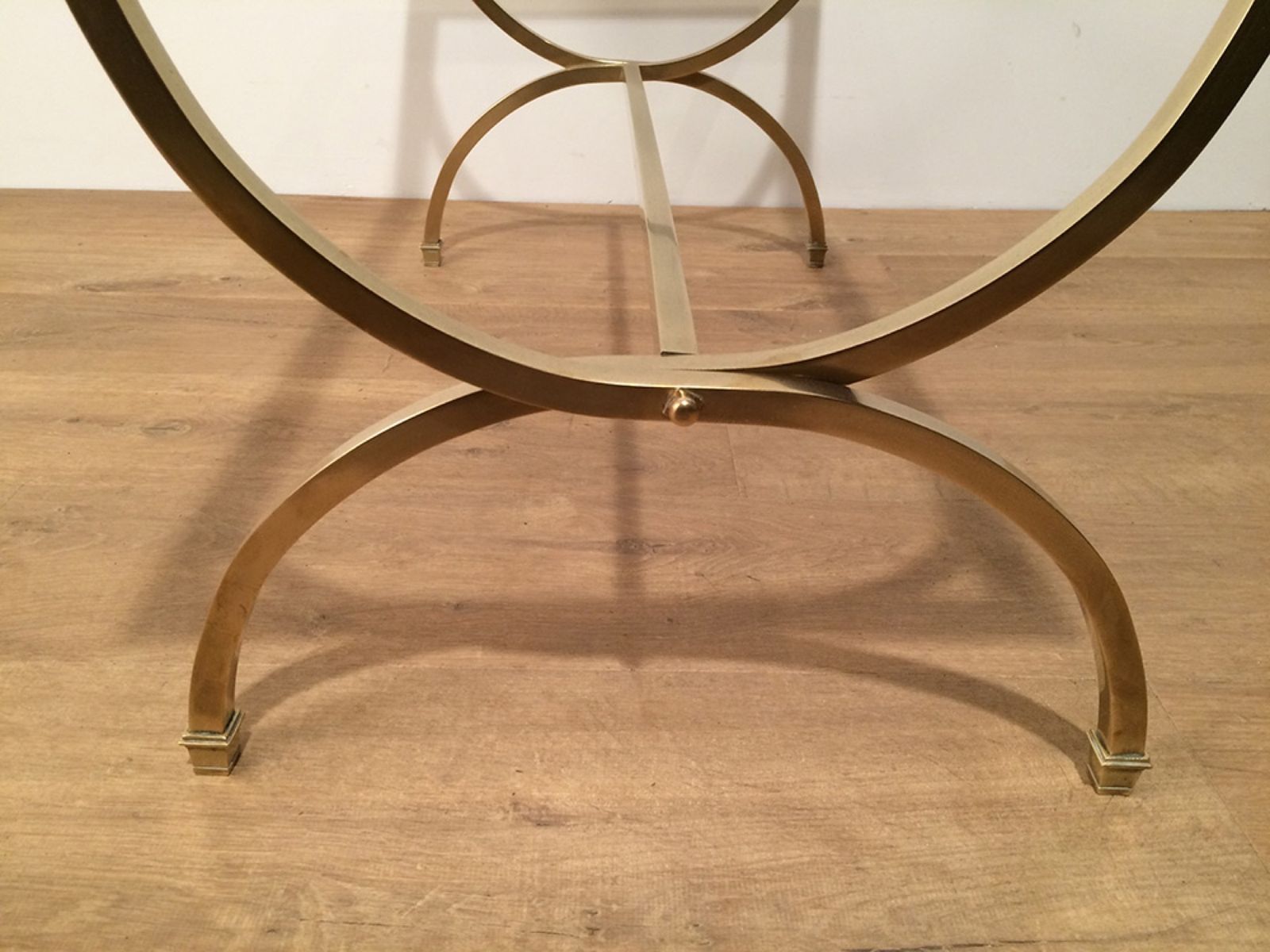 photo furniture Brass Coffee Table With Clear Glass Top And Black Lacquered Rim From Maison Jansen