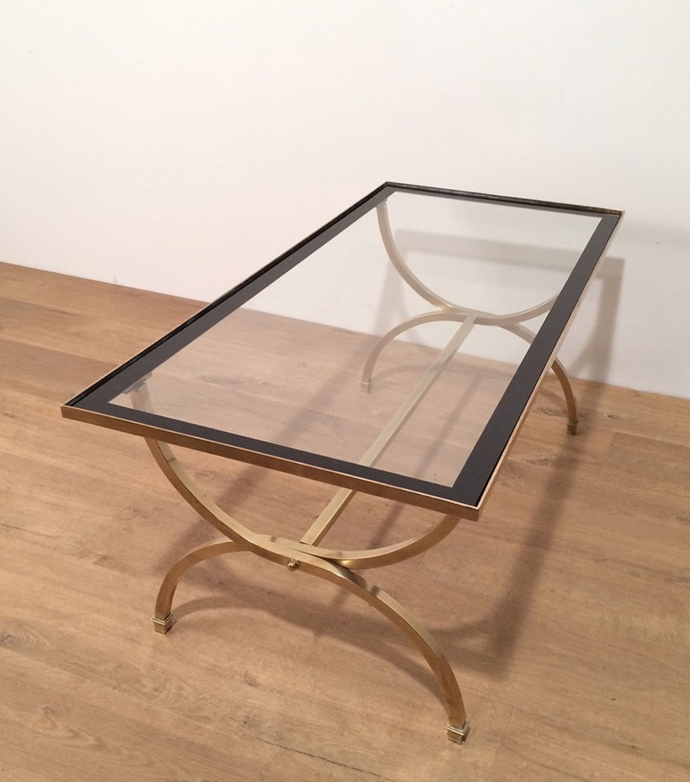 1950.0 Brass Coffee Table With Clear Glass Top And Black Lacquered Rim From Maison Jansen photo