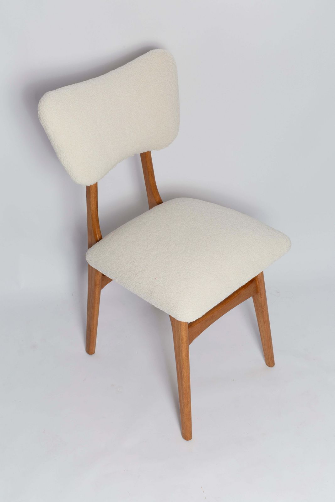 Mid Century Butterfly Chair, Light Ivory Boucle, Light Oak Wood, Europe, 1960s photo for sale