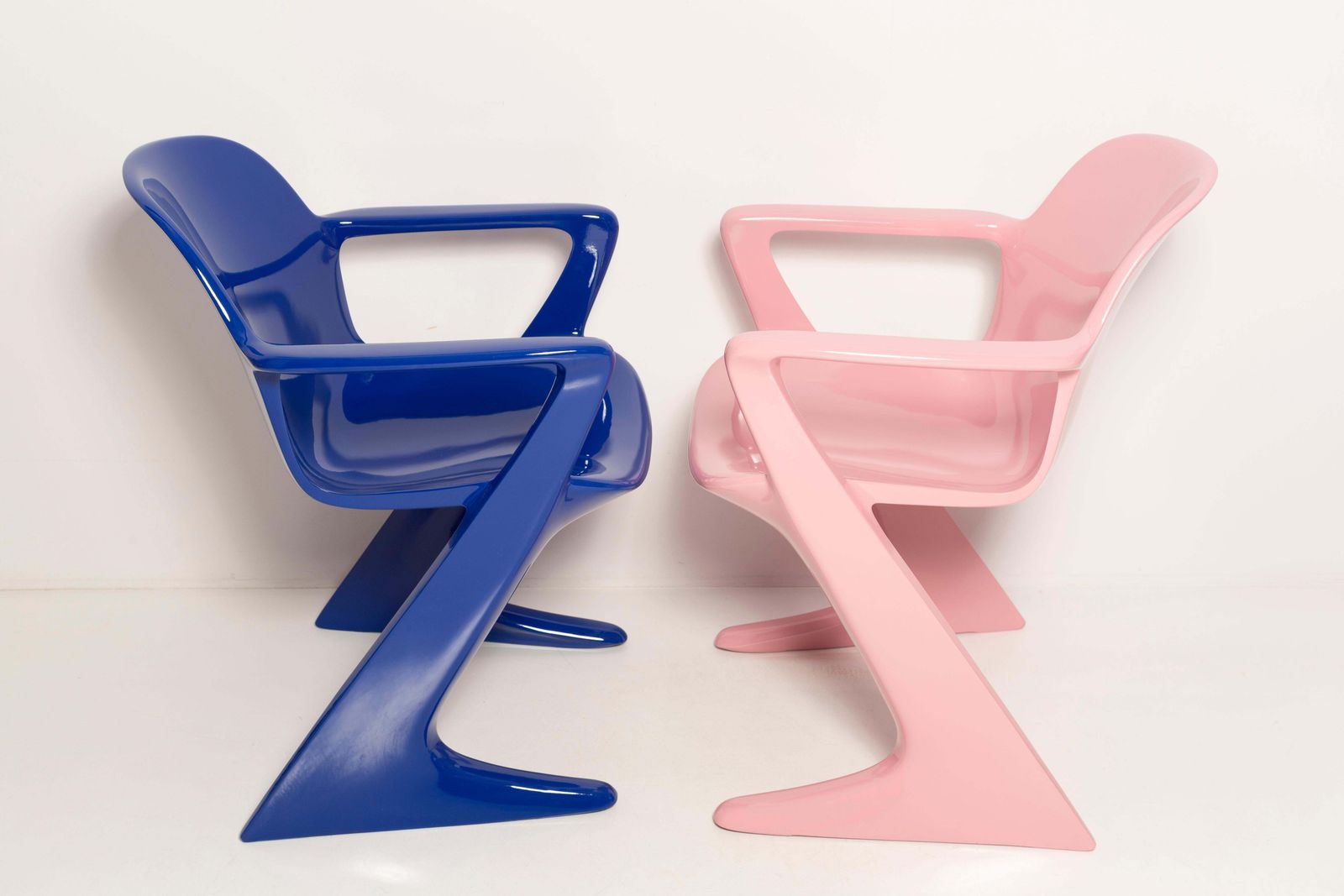 photo furniture Two Mid Century Baby Pink And Blue Kangaroo Chairs, Ernst Moeckl, Germany, 1968