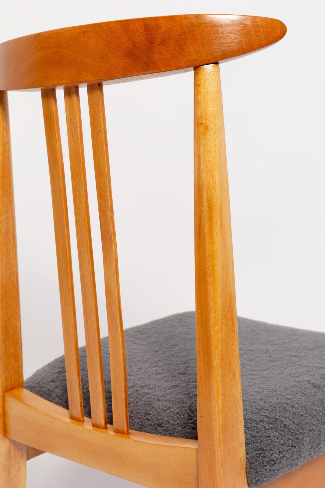 photo furniture Eight Mid Century Graphite Boucle Chairs, Light Wood, M Zielinski, Europe, 1960