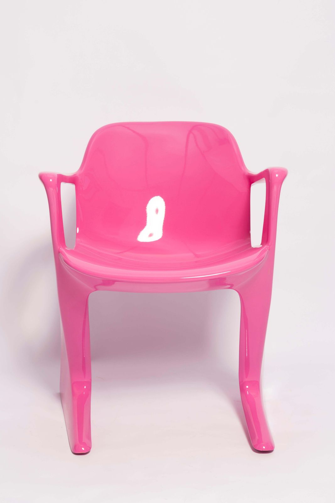 photo furniture Set Of Four Mid Century Pink Kangaroo Chairs, Ernst Moeckl, Germany, 1960s