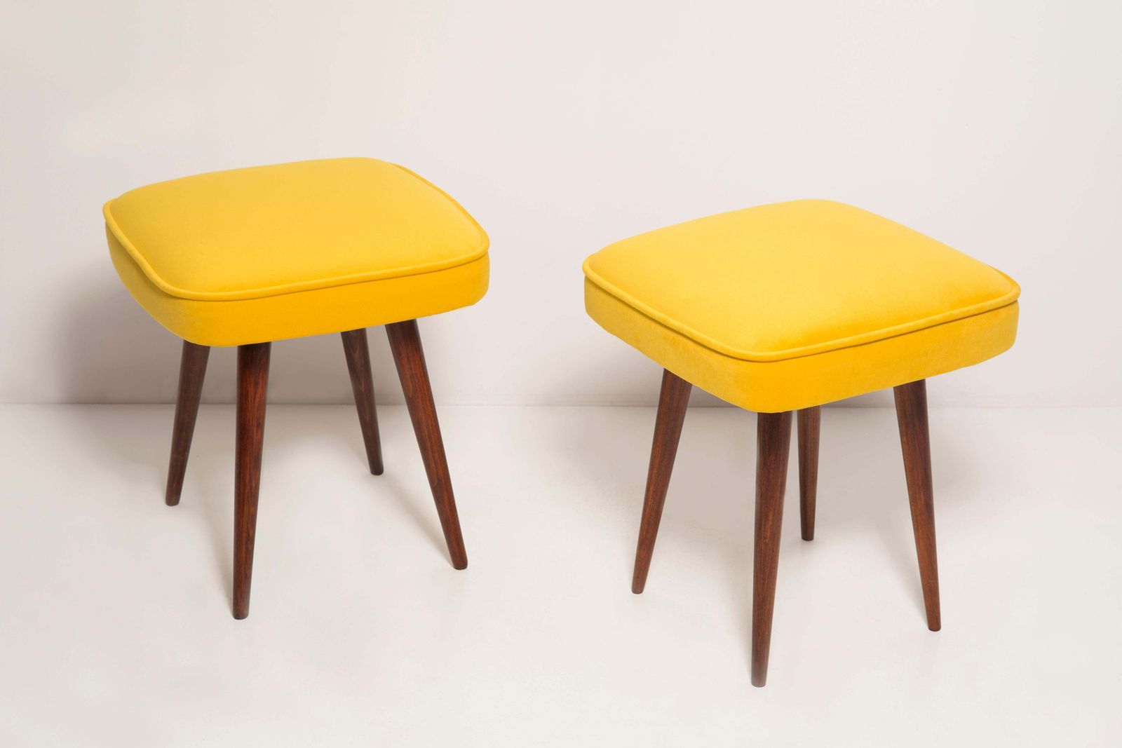 photo furniture Set Of Two Mid Century Yellow Velvet Foot Stools, Europe, 1960s