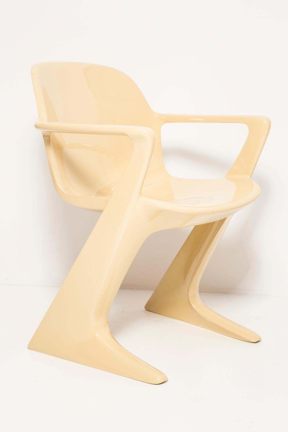 photo furniture Midcentury Beige And Red Kangaroo Chairs And Table Ernst Moeckl, Germany, 1968