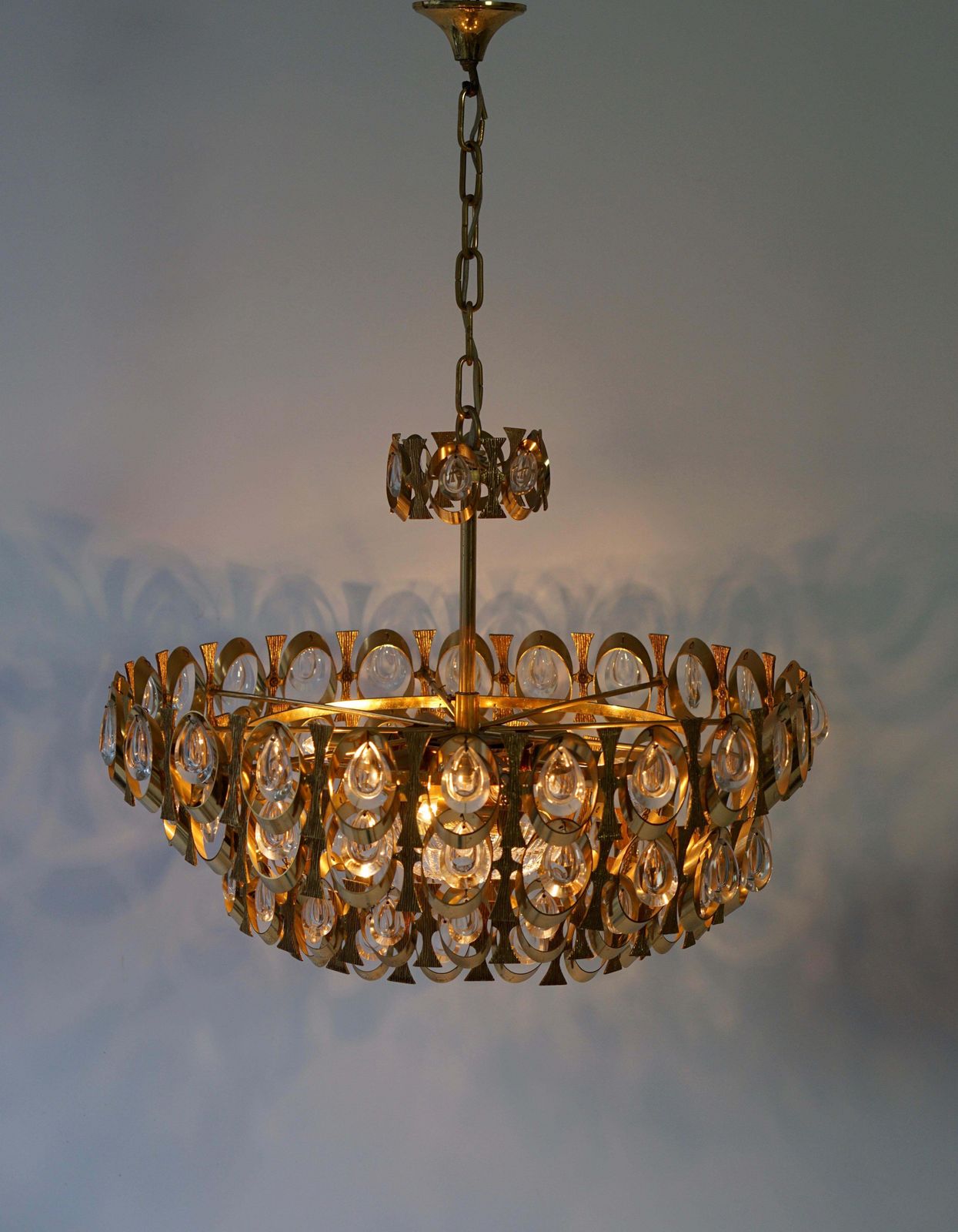 photo vintage 1960s Palwa Six Light Crystal Glass And Gilt Brass Chandelier By Palwa