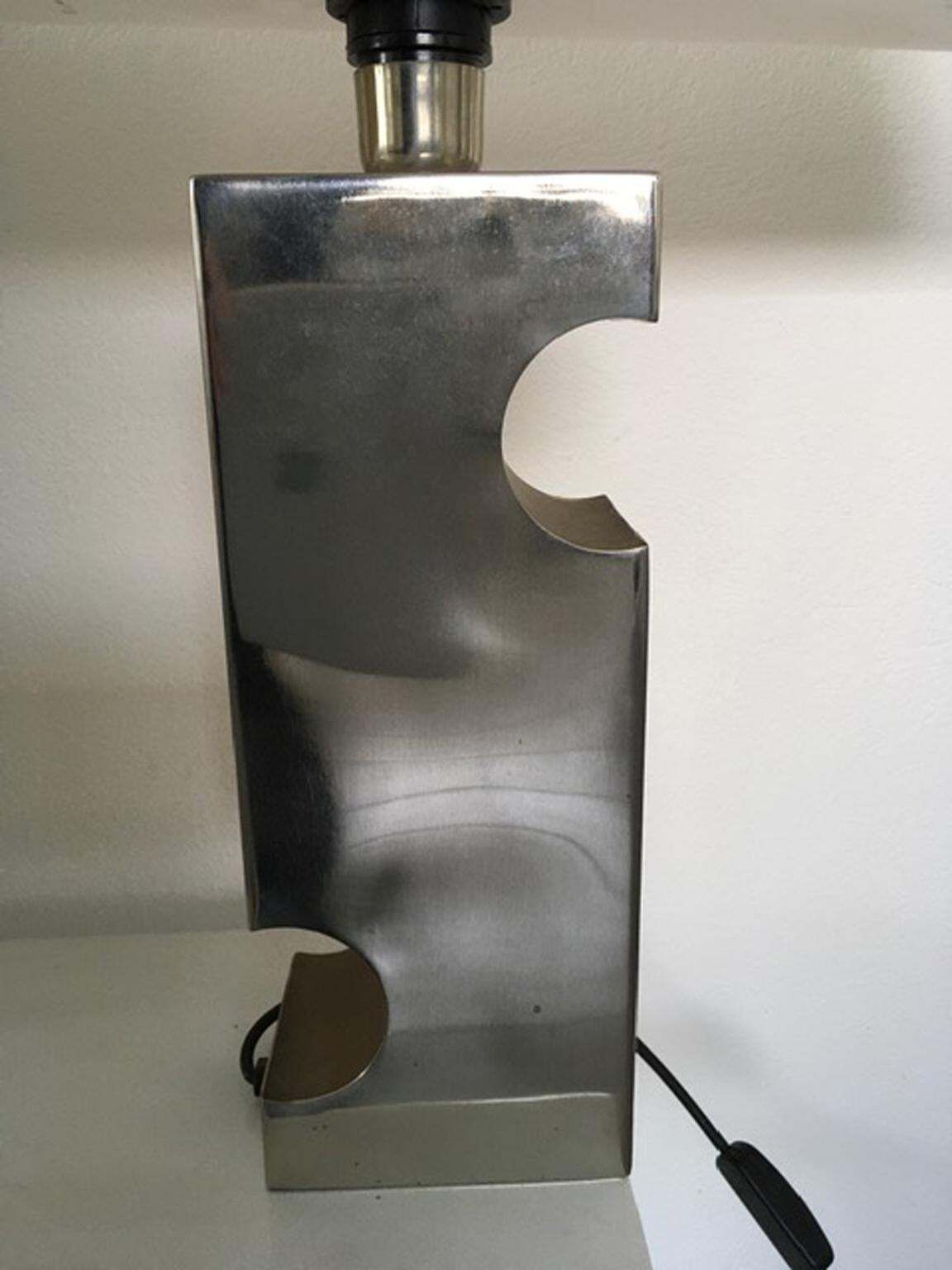 photo furniture Italy 1970 Duoble Faced Inox Steel And Plexiglass Table Lamp