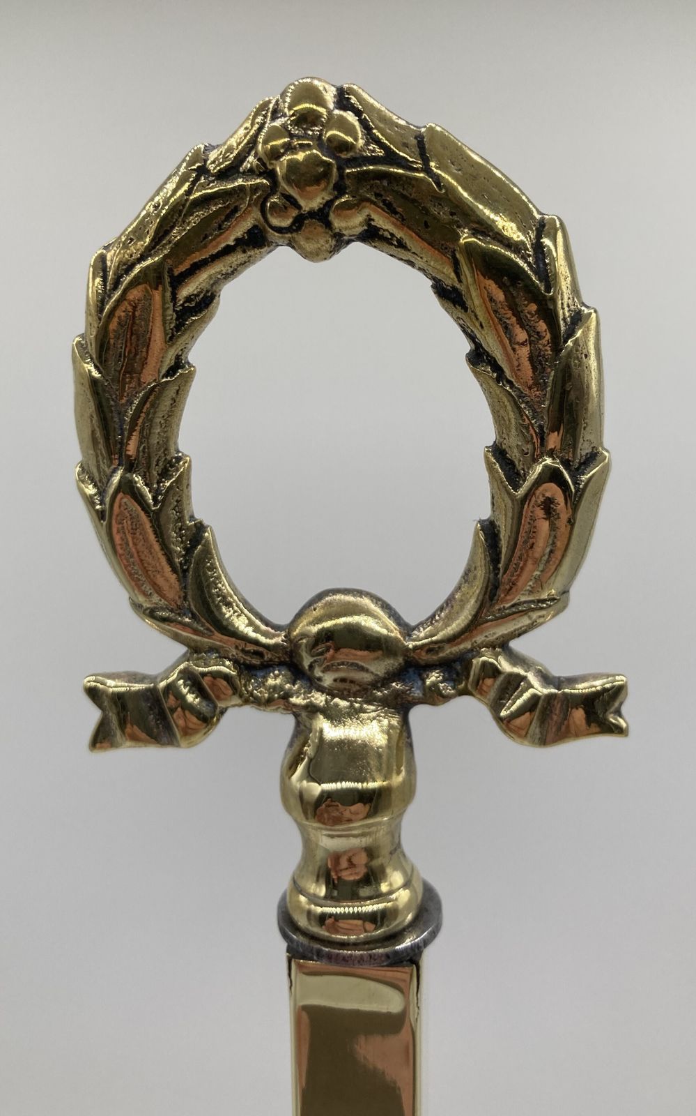 A Late 19th Century Tall Brass Door Porter photo furniture