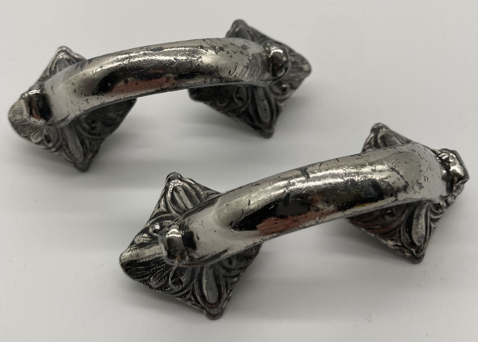A Pair Of Edwardian Silver Plated Cupboard Handles photo for sale