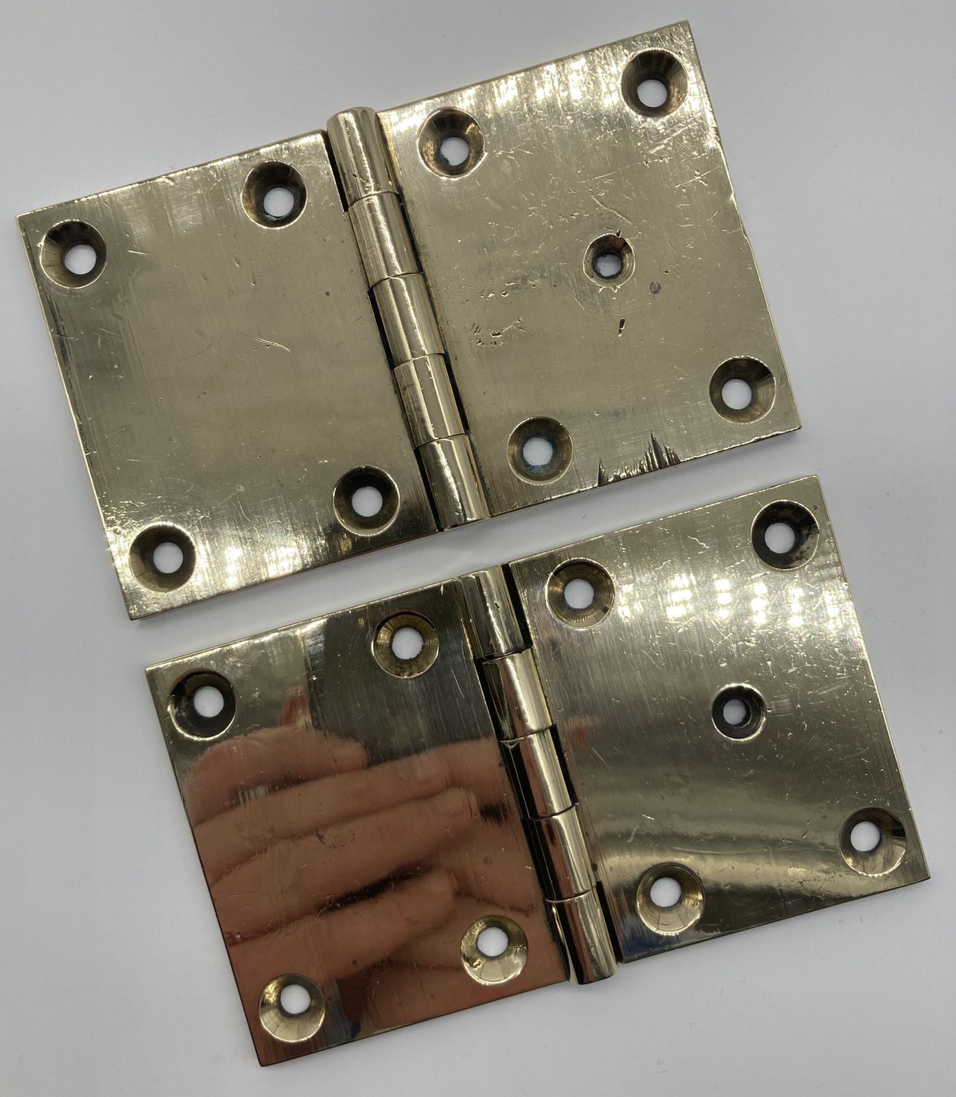 A Pair Of Square Brass Door Hinges photo for sale