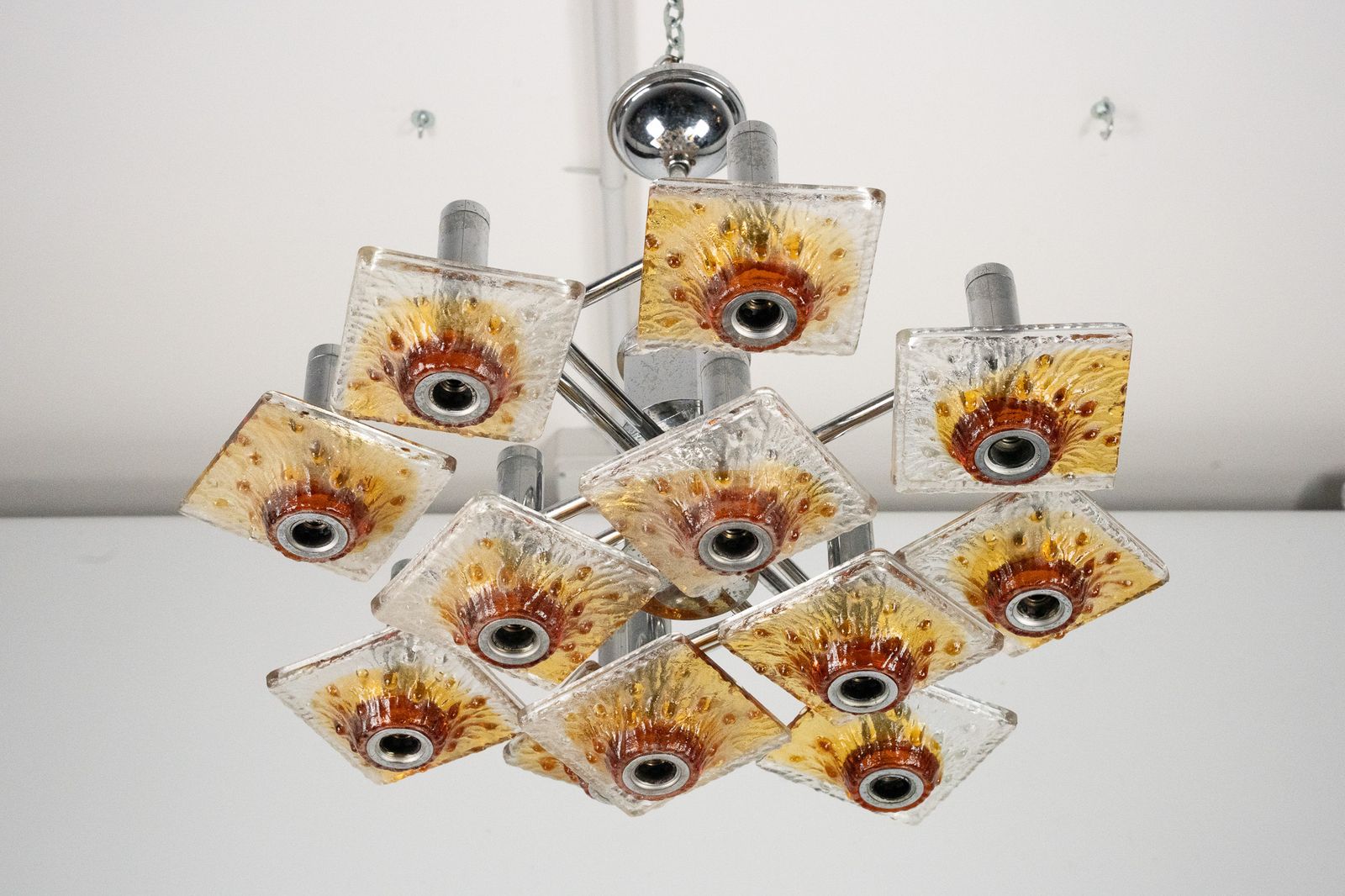 12 Light Mazzega Chandelier In Amber And Clear Murano Glass And Chrome. Italy 1970s photo for sale