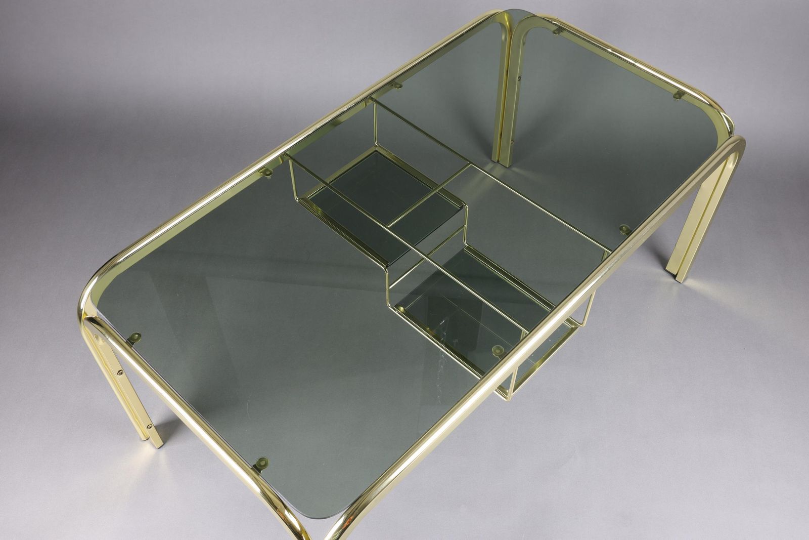 Vintage 1970s Smoked Glass Coffee Table With Gold Accents | Glass Top Table For Living Room | Rectangular Coffee Table With Storage Shelf photo for sale