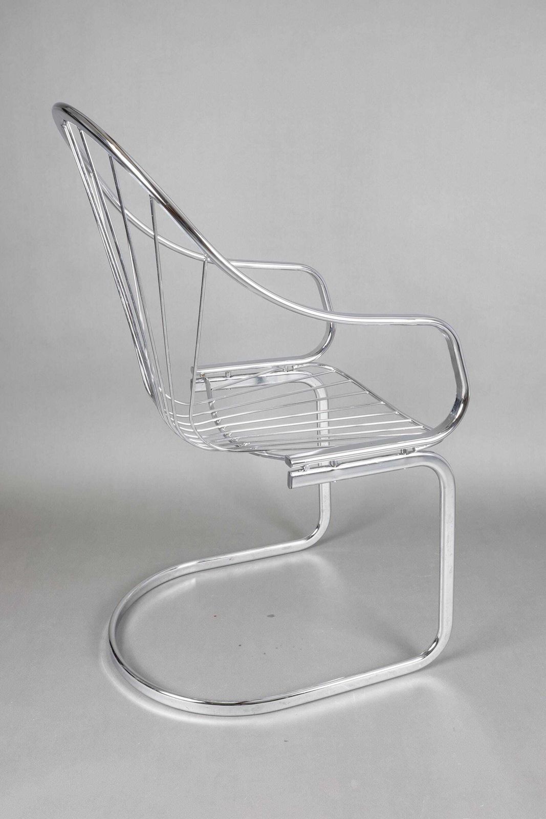 photo furniture 1970s Gastone Rinaldi Chrome Dining Chairs Set Of 4 | Mid Century Modern Furniture | Retro Dining Chairs With Black Cushions