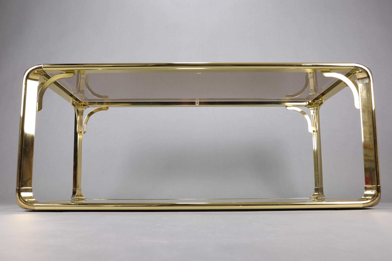 photo for sale Salontafel Met Rookglas Uit De Jaren 1970 | Hollywood Regency Stijl | Gouden Accenten | Mid Century Modern