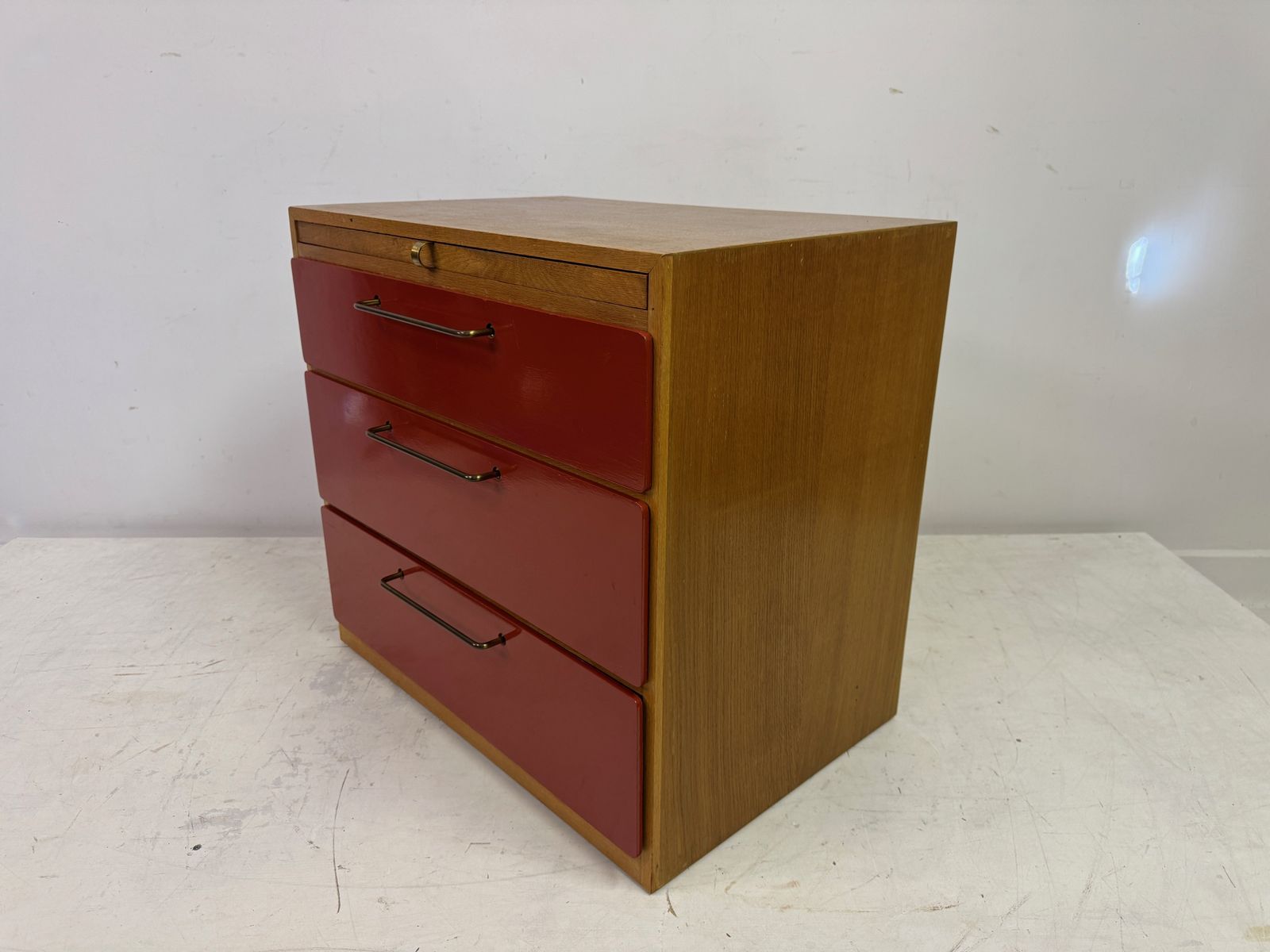 photo furniture 1960s Red Chest Of Drawers With Pull Out Slide By Heals