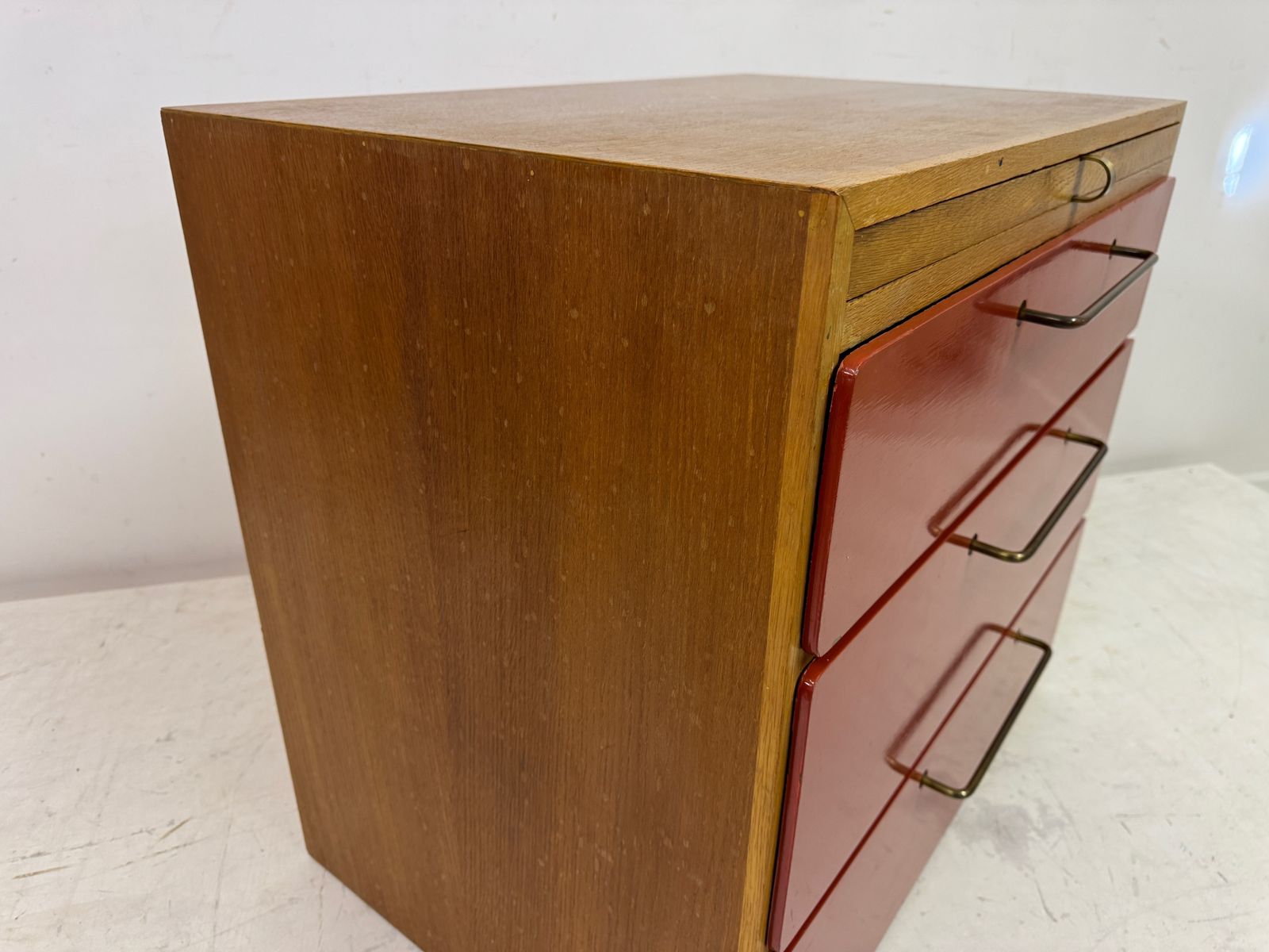 795.0 1960s Red Chest Of Drawers With Pull Out Slide By Heals photo