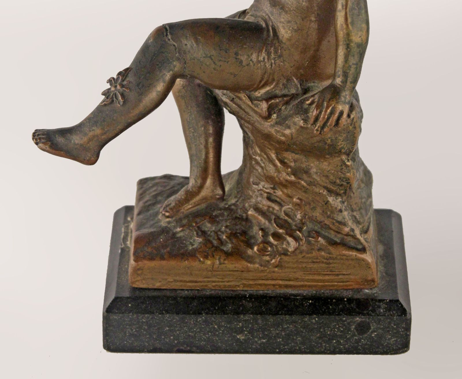 photo furniture Early 20th Century French Bronze Sculpture With Marble Base Of A Sitting Boy