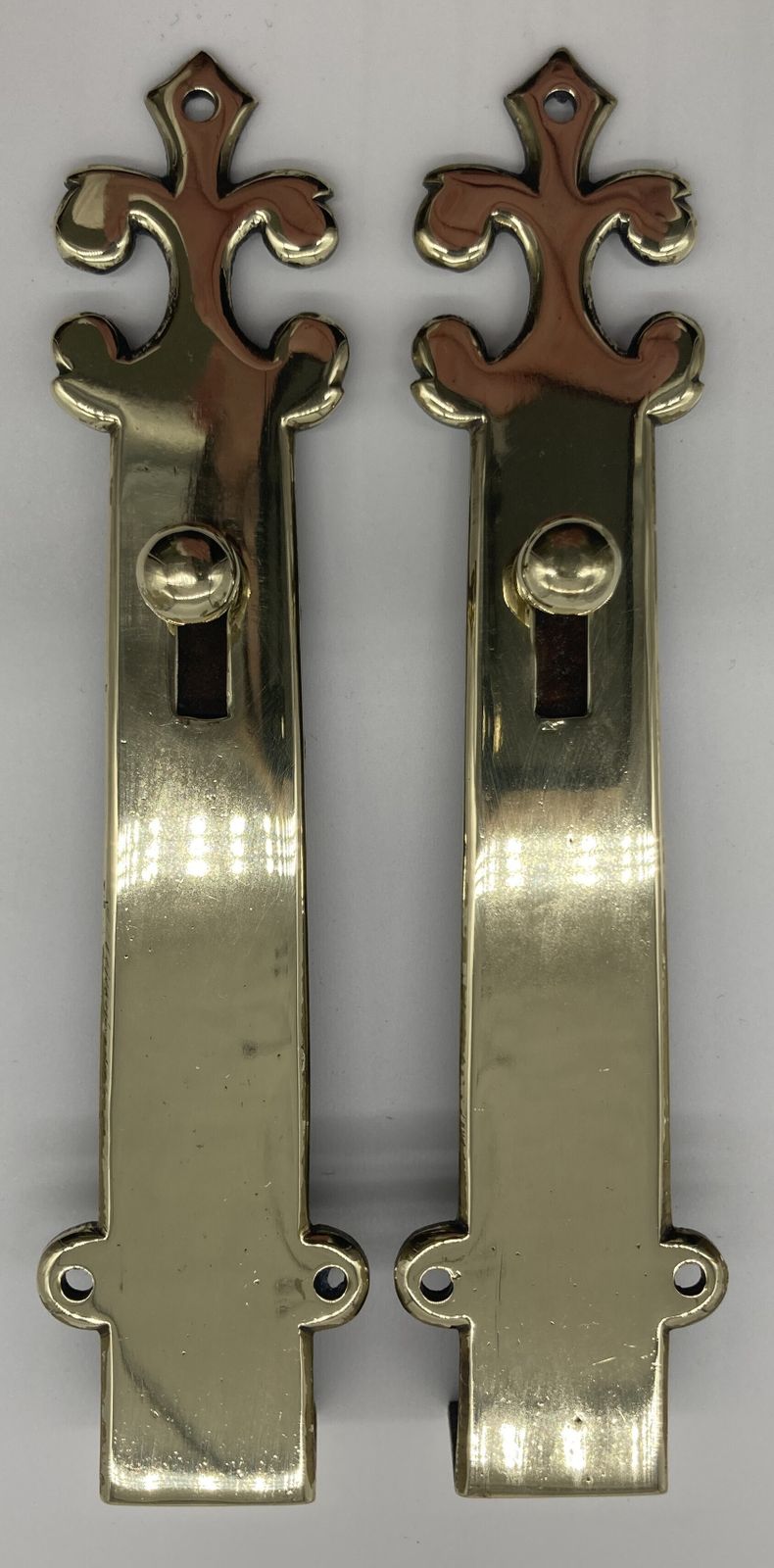 A Pair Of Small Brass Door Shut Bolts