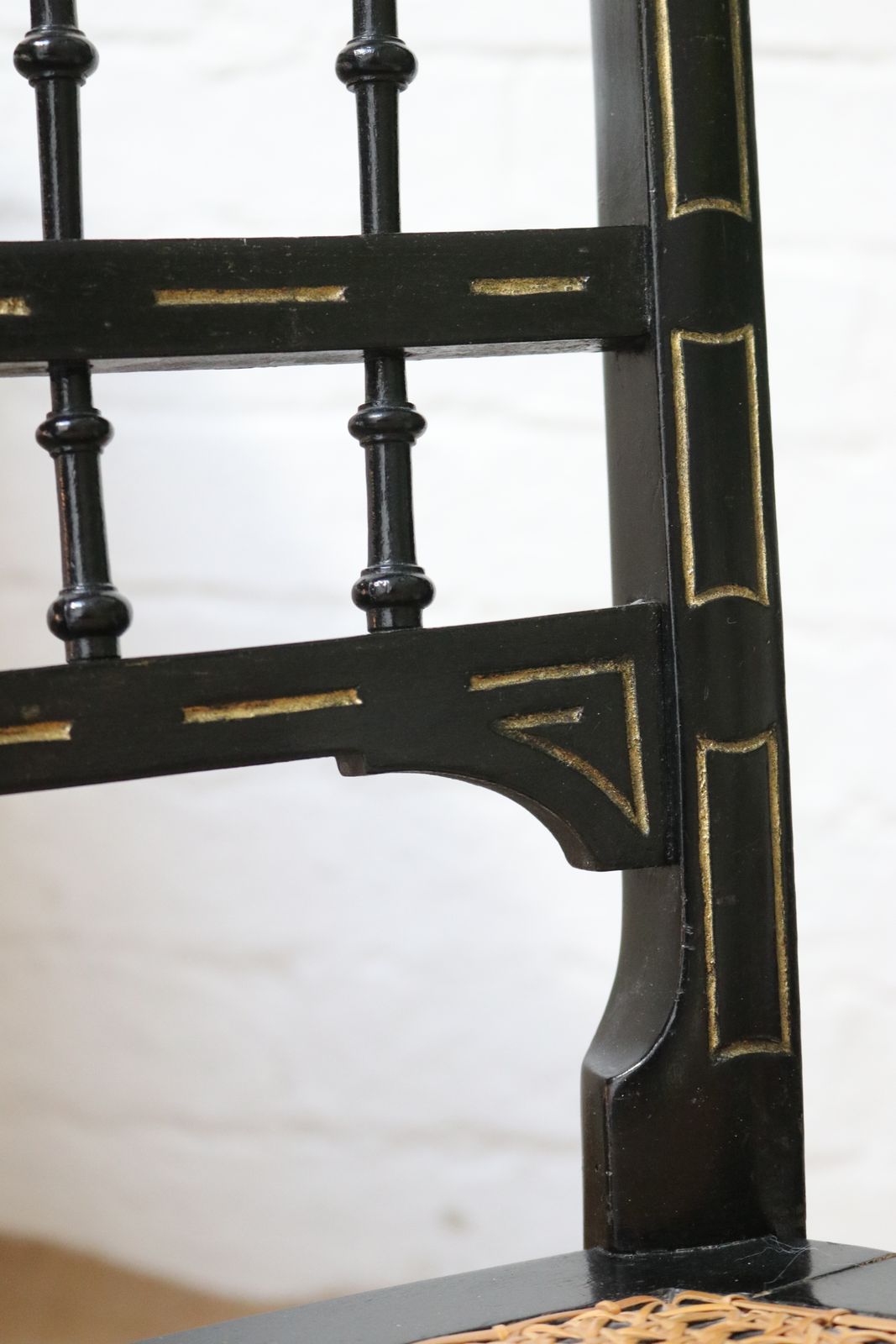 Furniture Antique Black Rattan Nursing Chair photo