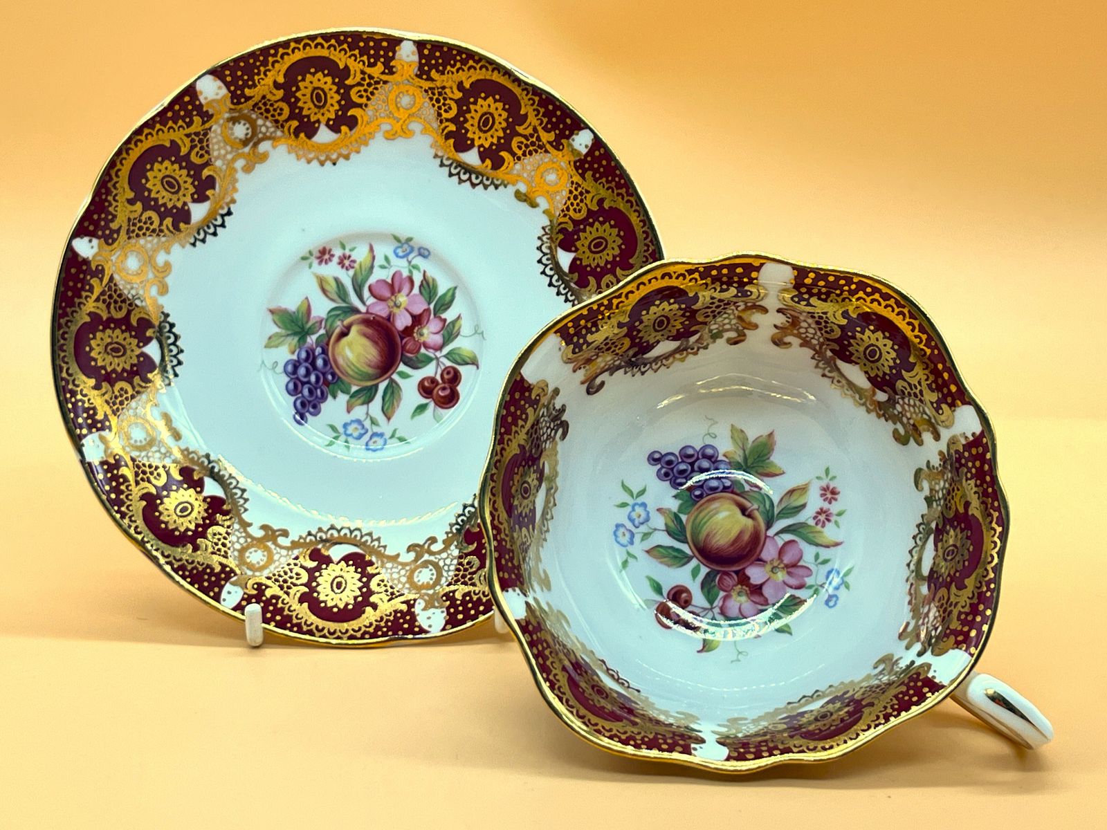 Vintage Paragon China Quatrefoil Shape Red And Gold With Pink Chintz Centre Tea Cup And Saucer Duo.