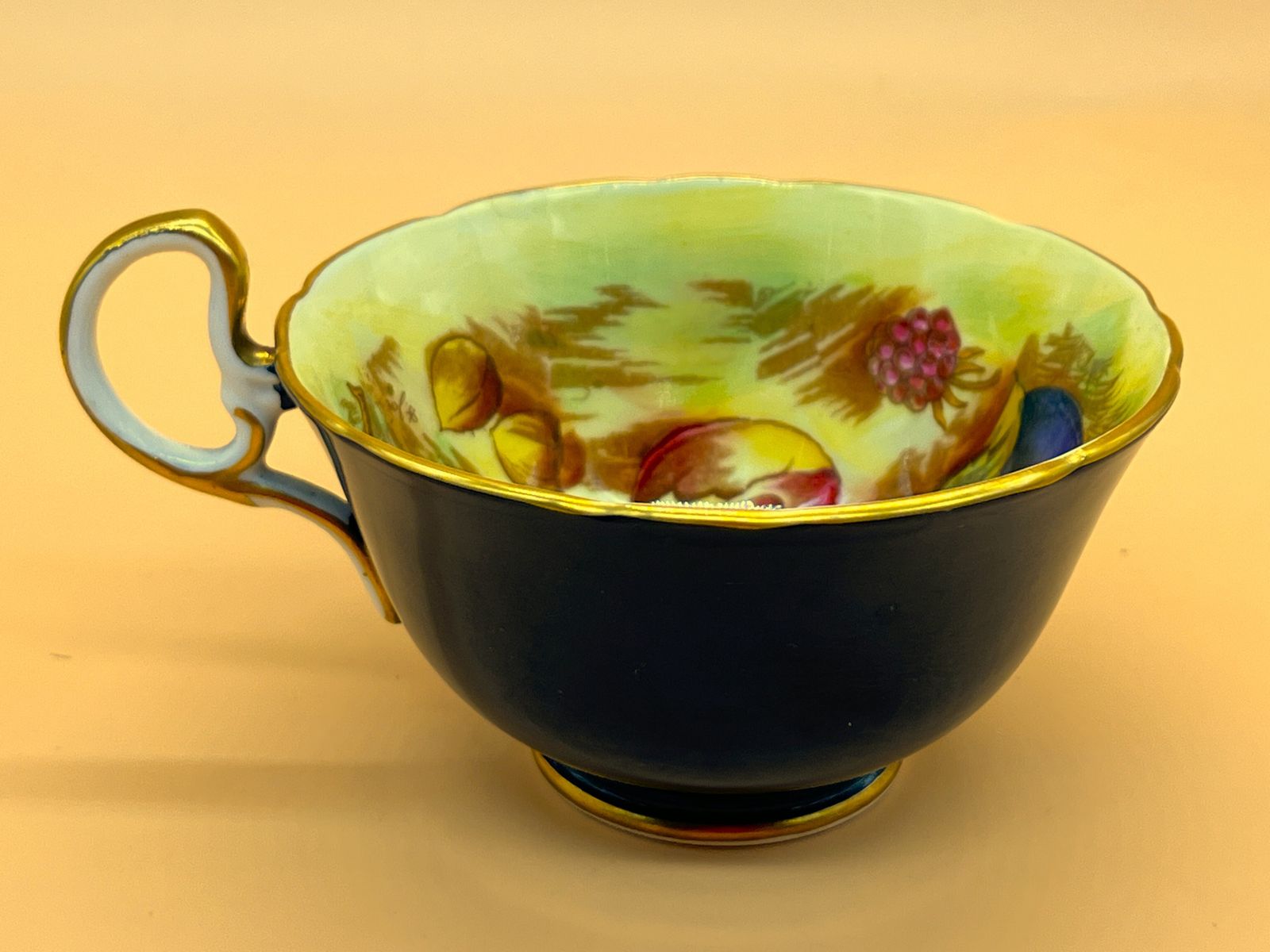 Aynsley China Orchard Gold Fruit Signed D Jones High Doris Shape Black And Gold Cabinet Tea Cup & Saucer Duo. C1952 63. photo vinterior