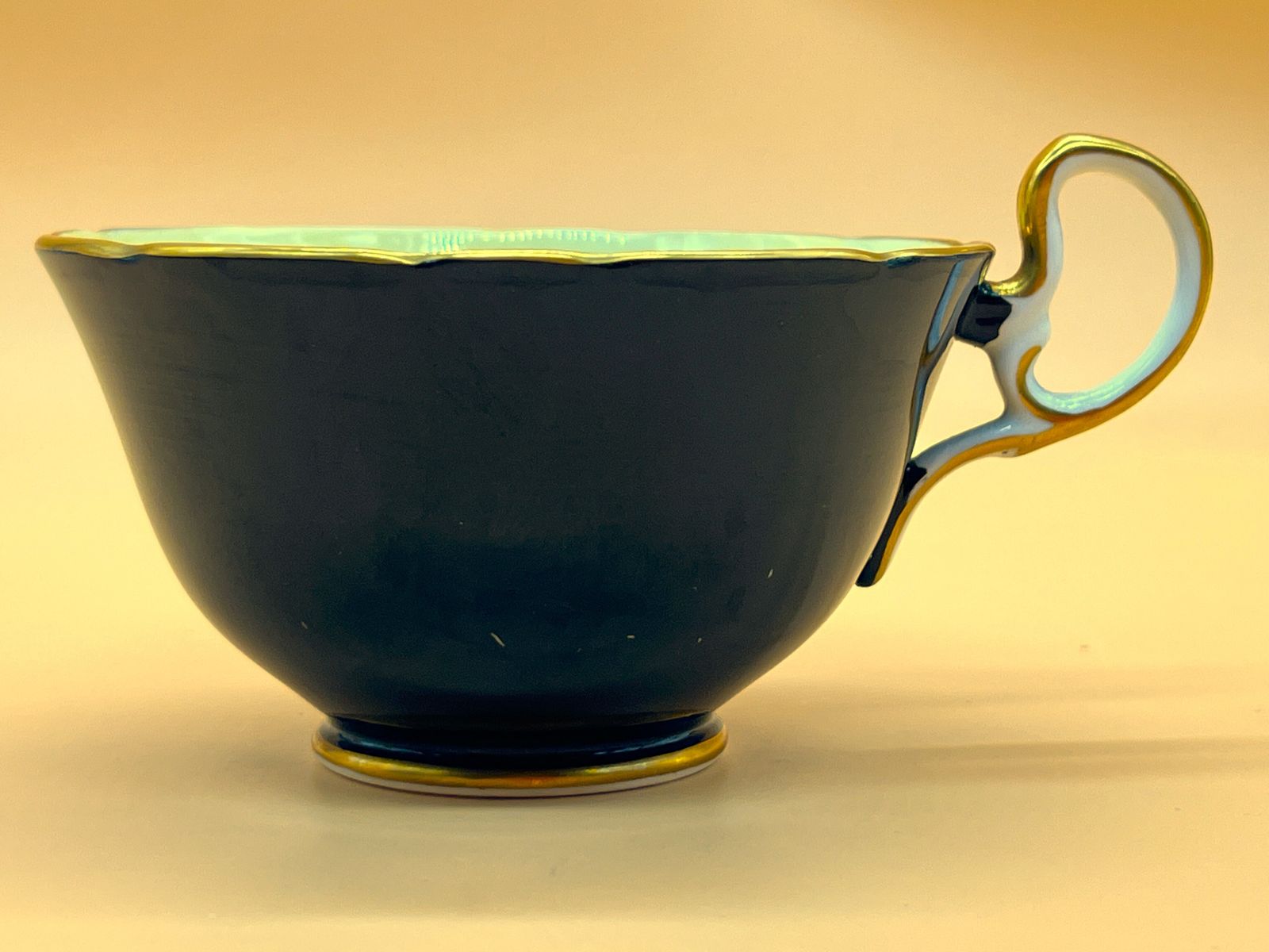 photo vinterior Aynsley China Orchard Gold Fruit Signed D Jones High Doris Shape Black And Gold Cabinet Tea Cup & Saucer Duo. C1952 63.